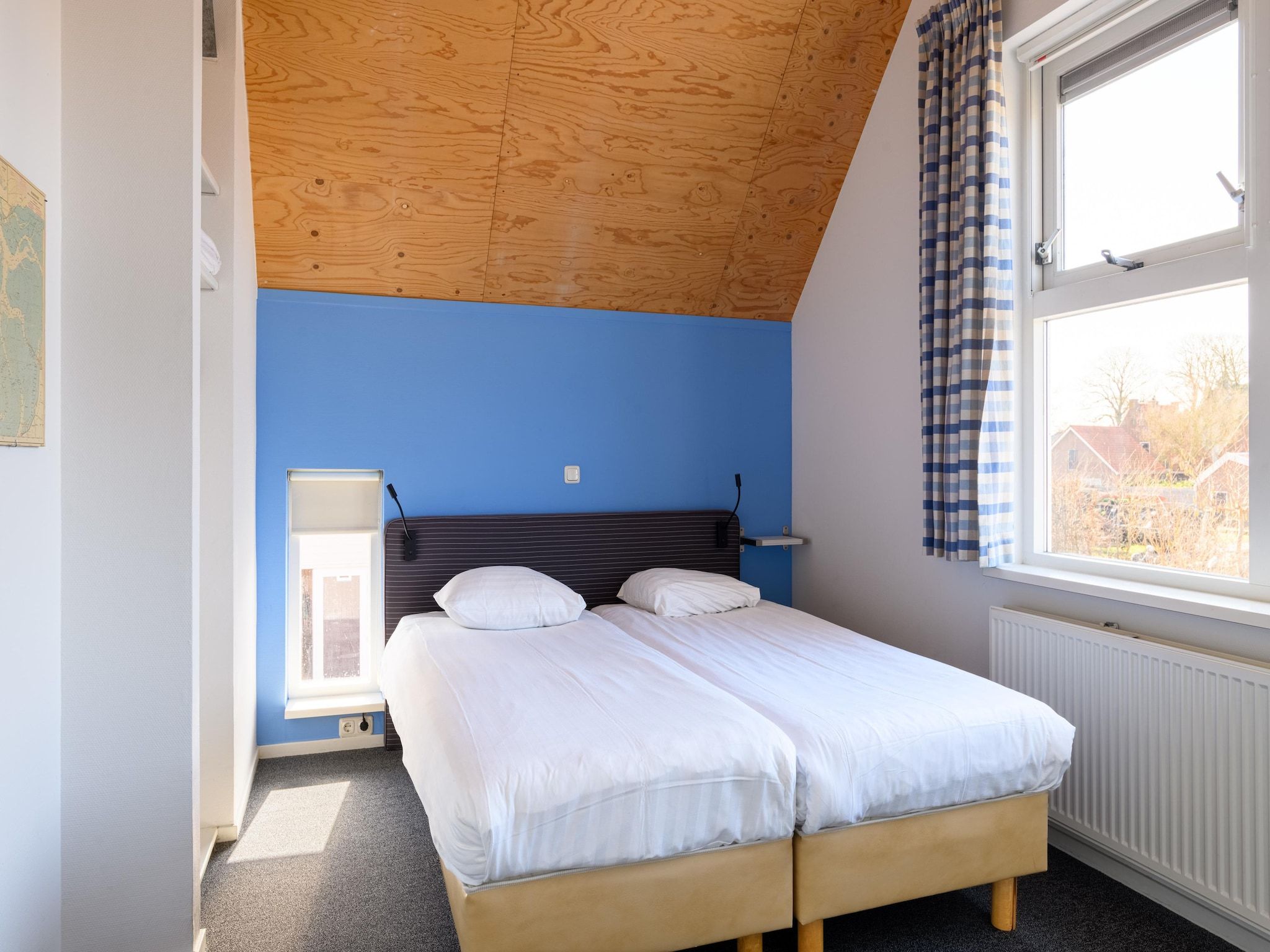 Een slaapkamer van Havenresort Terherne 2 in Terherne