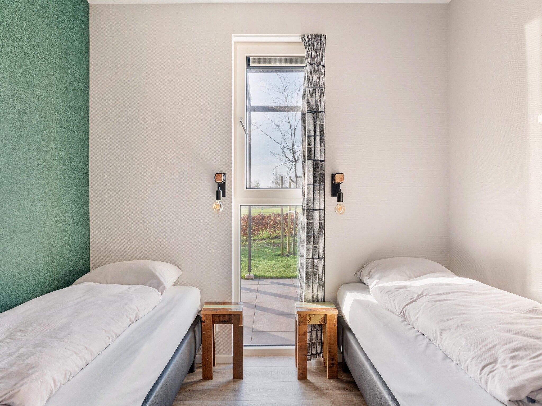 Een slaapkamer van Villapark Akenveen 4 in Tynaarlo