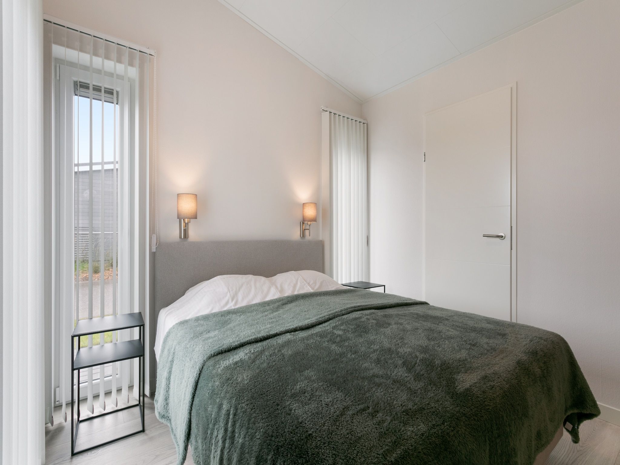 Een slaapkamer van Water Resort Oosterschelde 56 in Wemeldinge