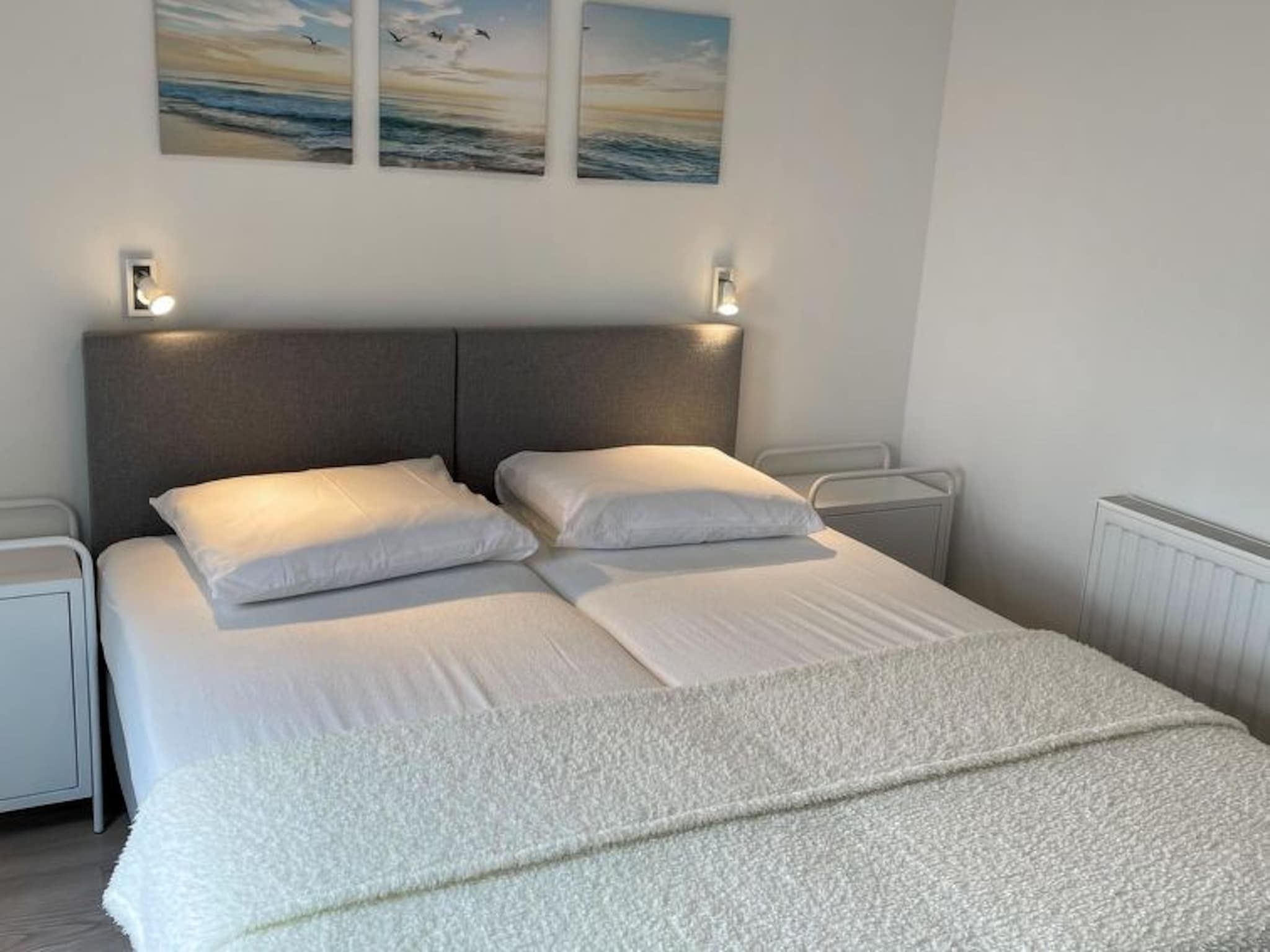 Een slaapkamer van Water Resort Oosterschelde 68 in Wemeldinge