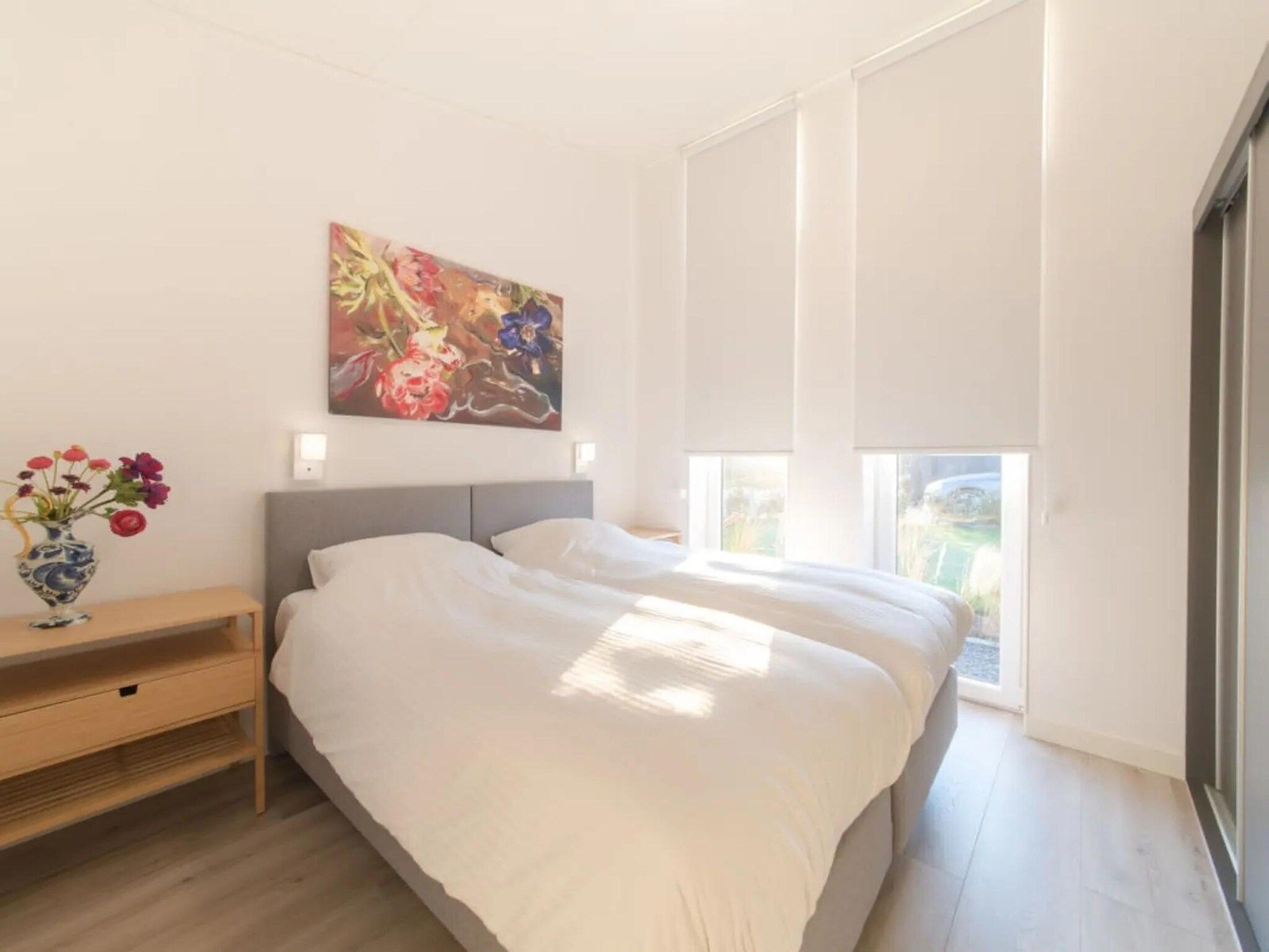 Een slaapkamer van Water Resort Oosterschelde 73 in Wemeldinge