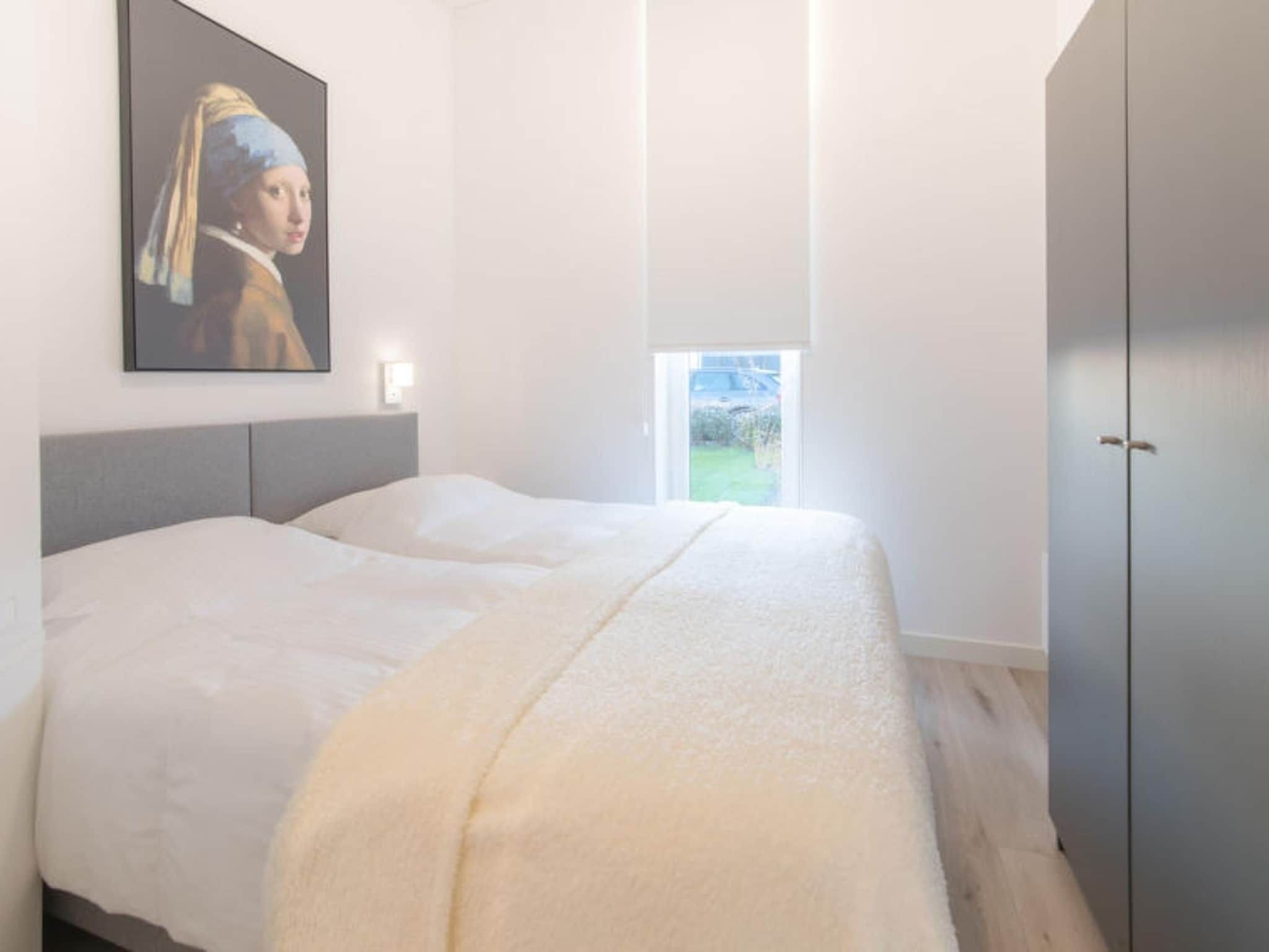 Een slaapkamer van Water Resort Oosterschelde 73 in Wemeldinge