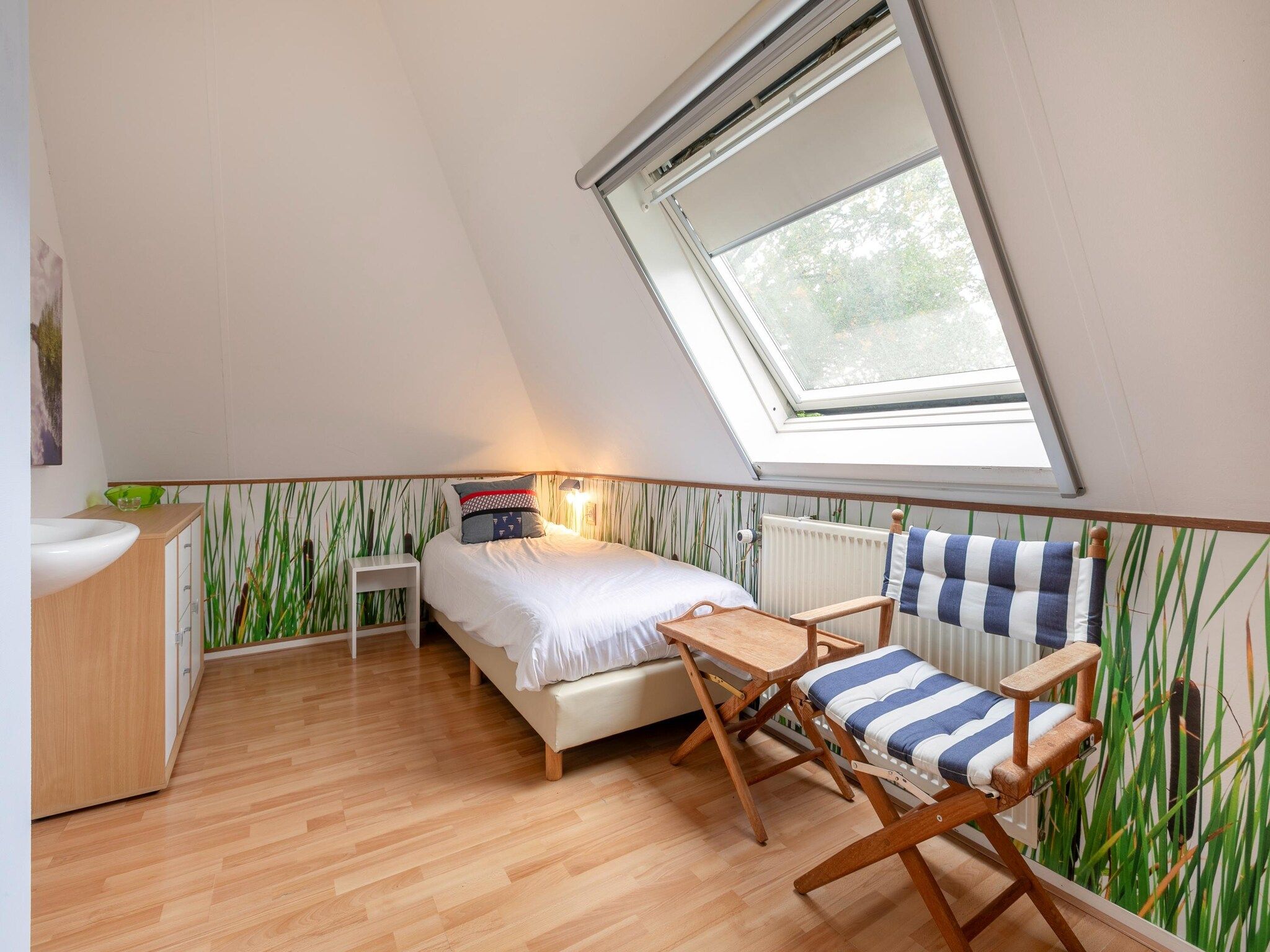 Een slaapkamer van Buitenplaats It Wiid 8 in Eernewoud