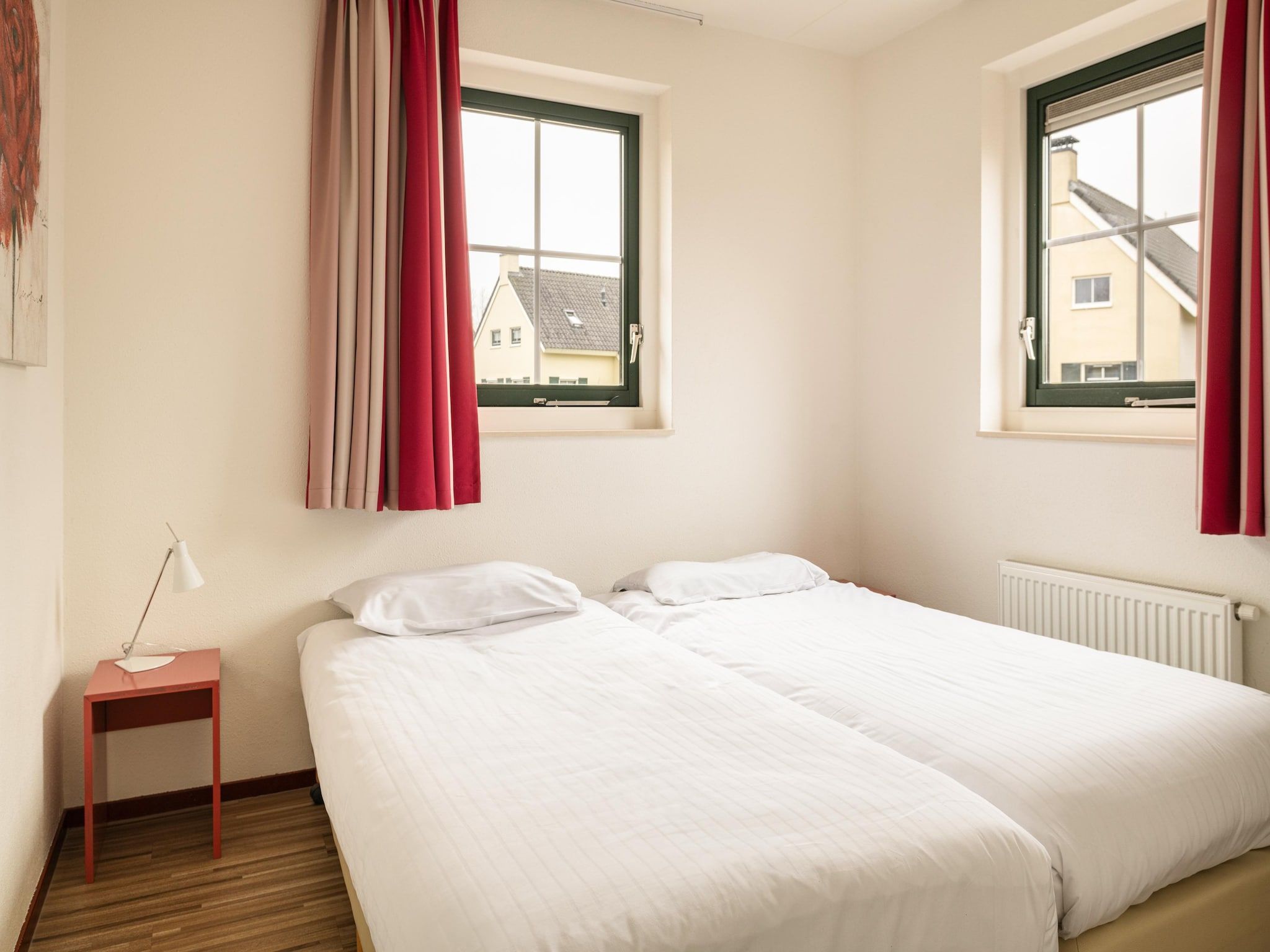 Een slaapkamer van Vakantiepark Emslandermeer 19 in Vlagtwedde