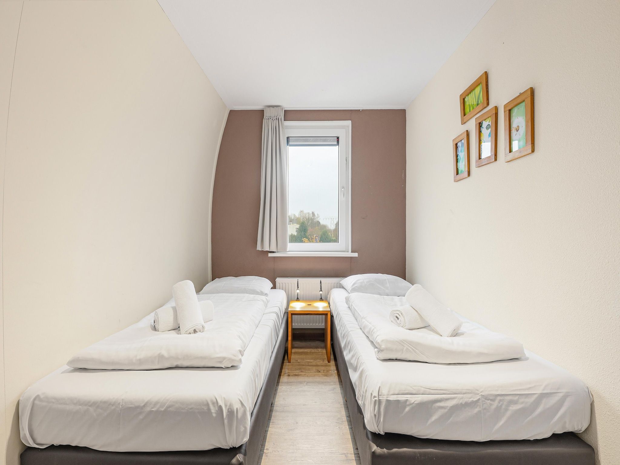 Een slaapkamer van Waterpark De Bloemert 2 in Midlaren