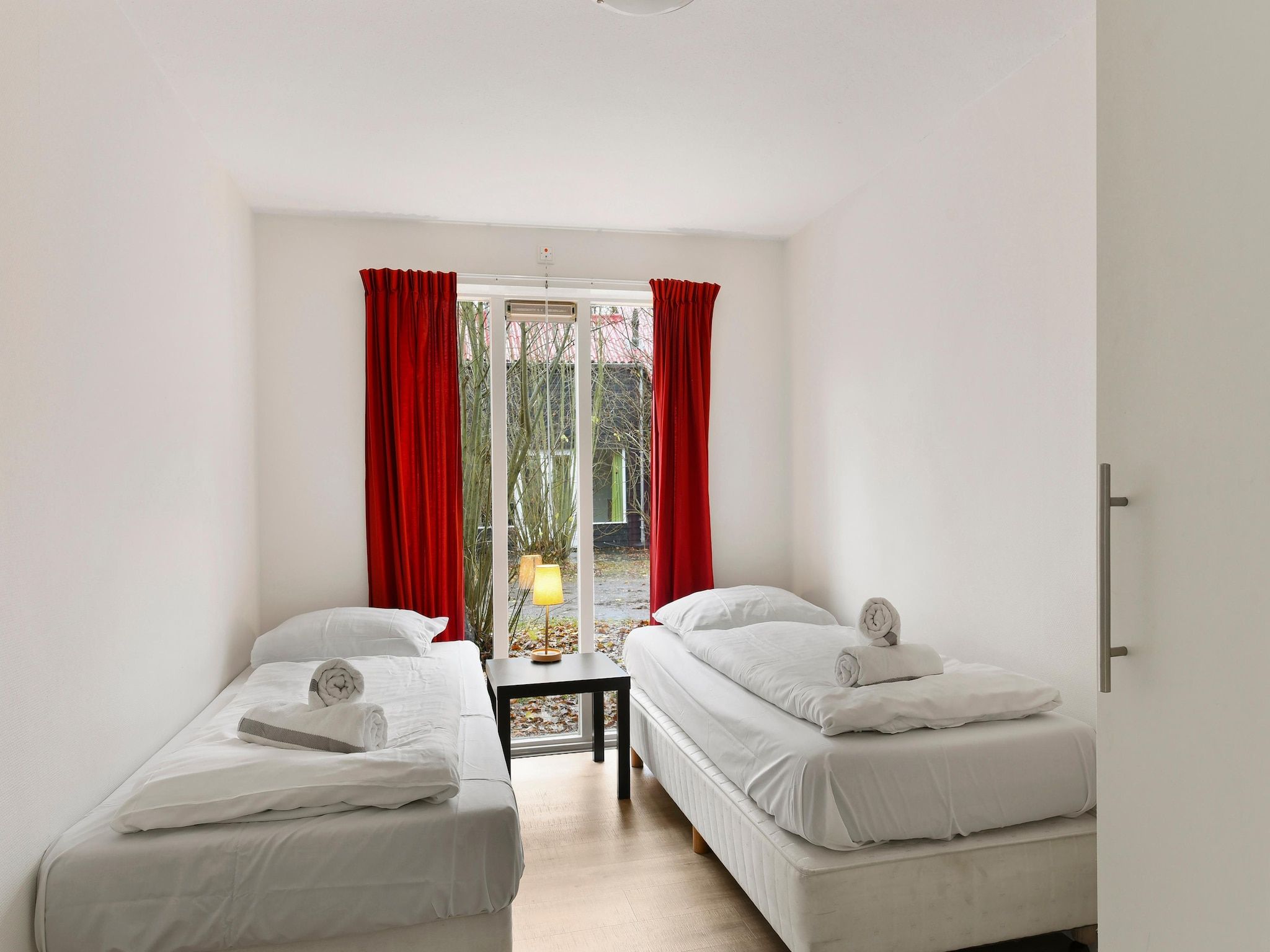 Een slaapkamer van Waterpark De Bloemert 4 in Midlaren