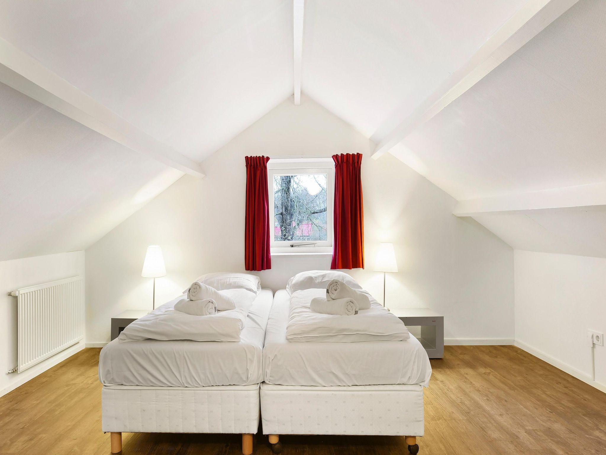 Een slaapkamer van Waterpark De Bloemert 4 in Midlaren