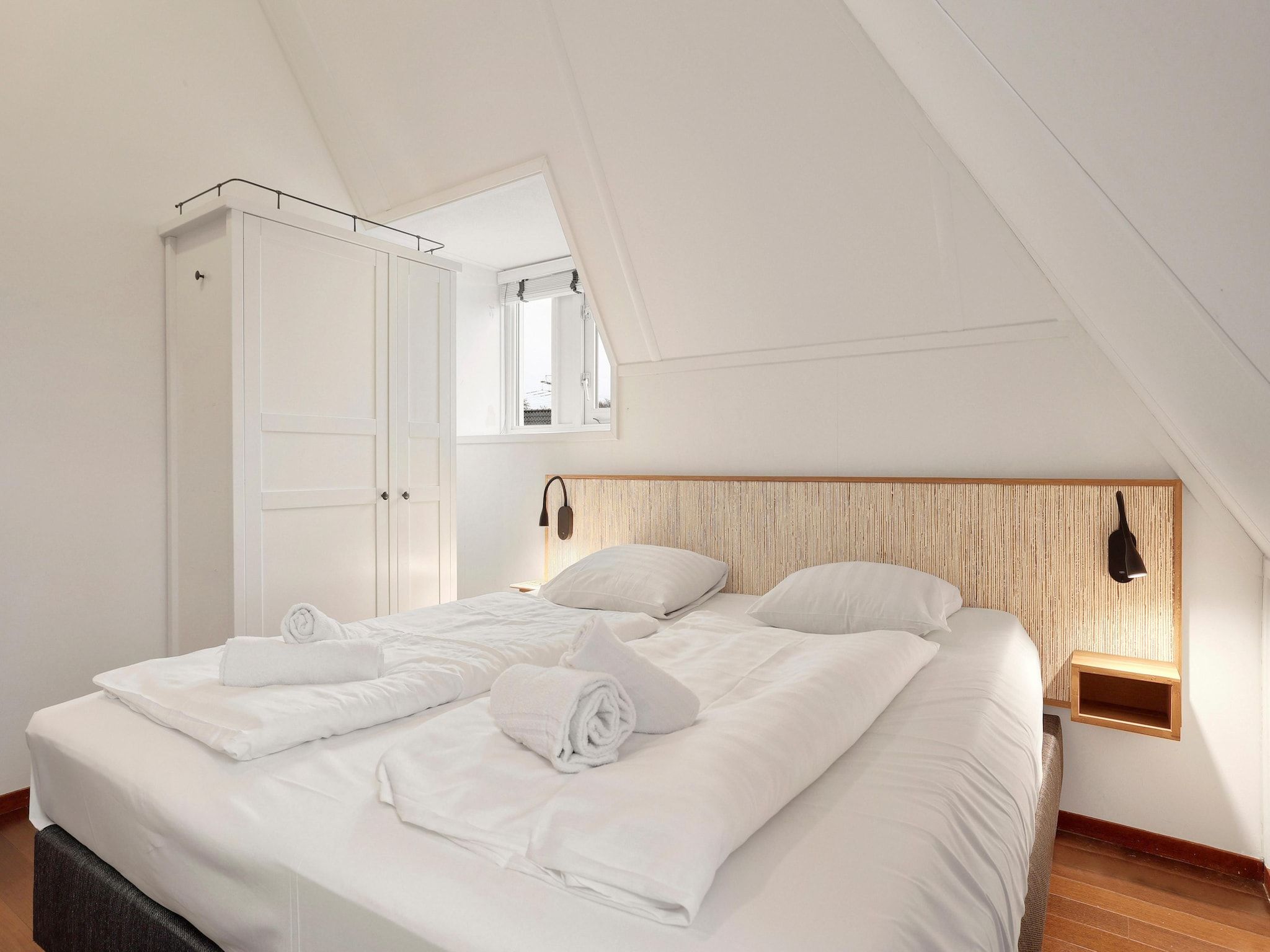 Een slaapkamer van Waterpark De Bloemert 9 in Midlaren