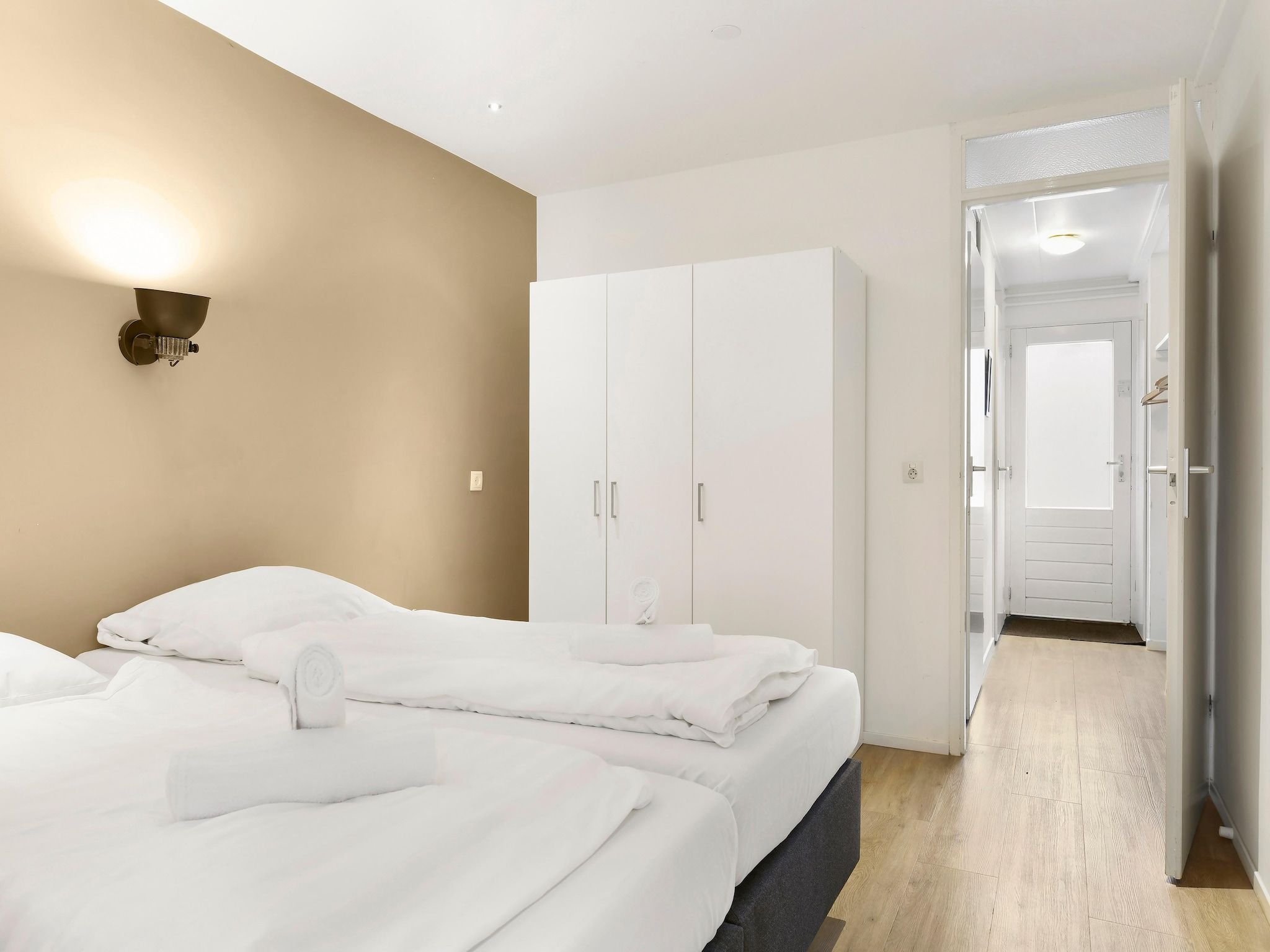 Een slaapkamer van Waterpark De Bloemert 10 in Midlaren