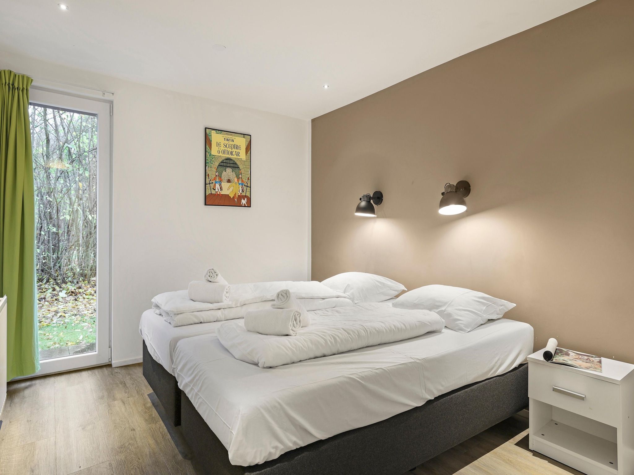 Een slaapkamer van Waterpark De Bloemert 12 in Midlaren