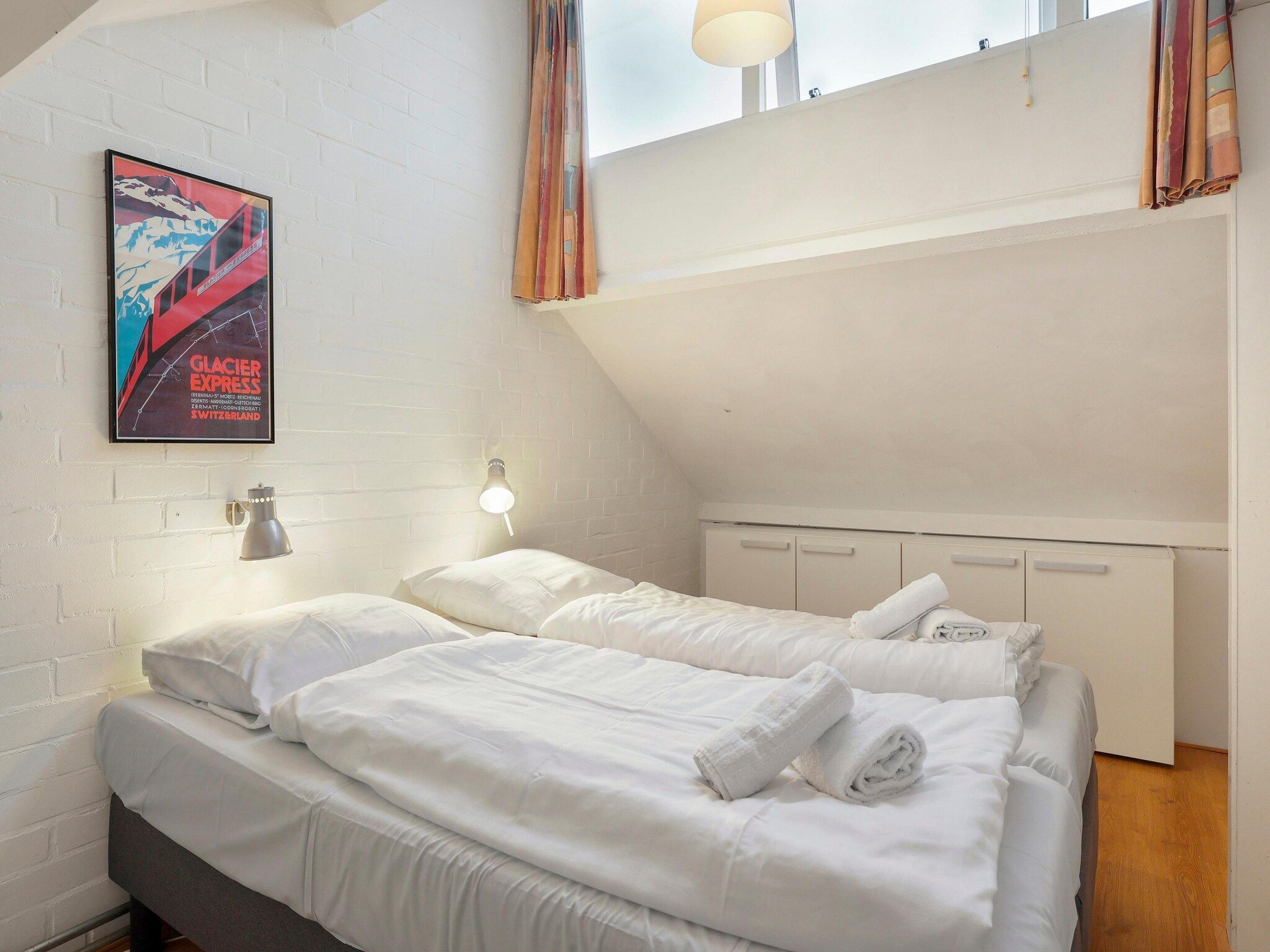 Een slaapkamer van Waterpark De Bloemert 12 in Midlaren