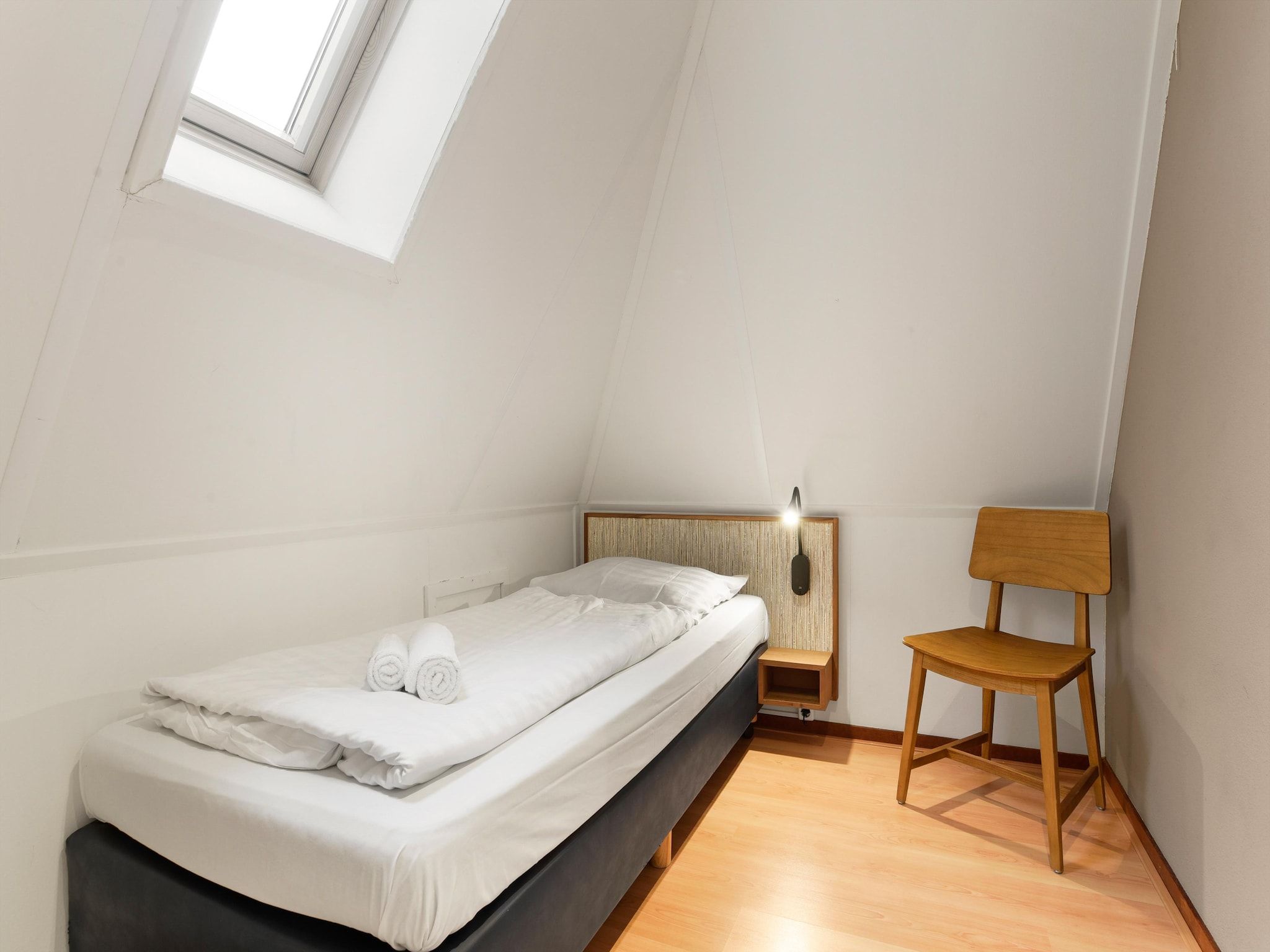 Een slaapkamer van Waterpark De Bloemert 13 in Midlaren