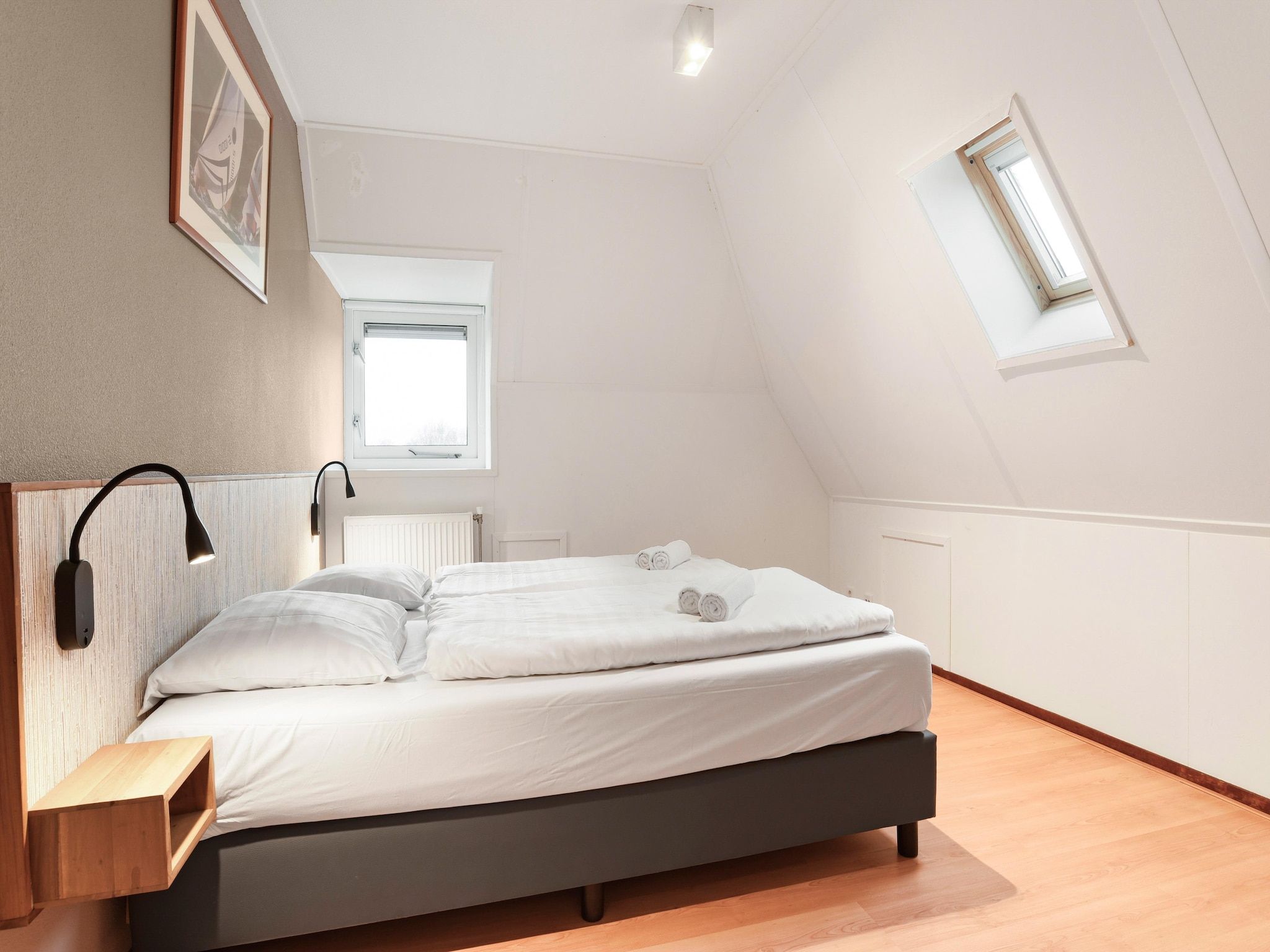 Een slaapkamer van Waterpark De Bloemert 13 in Midlaren