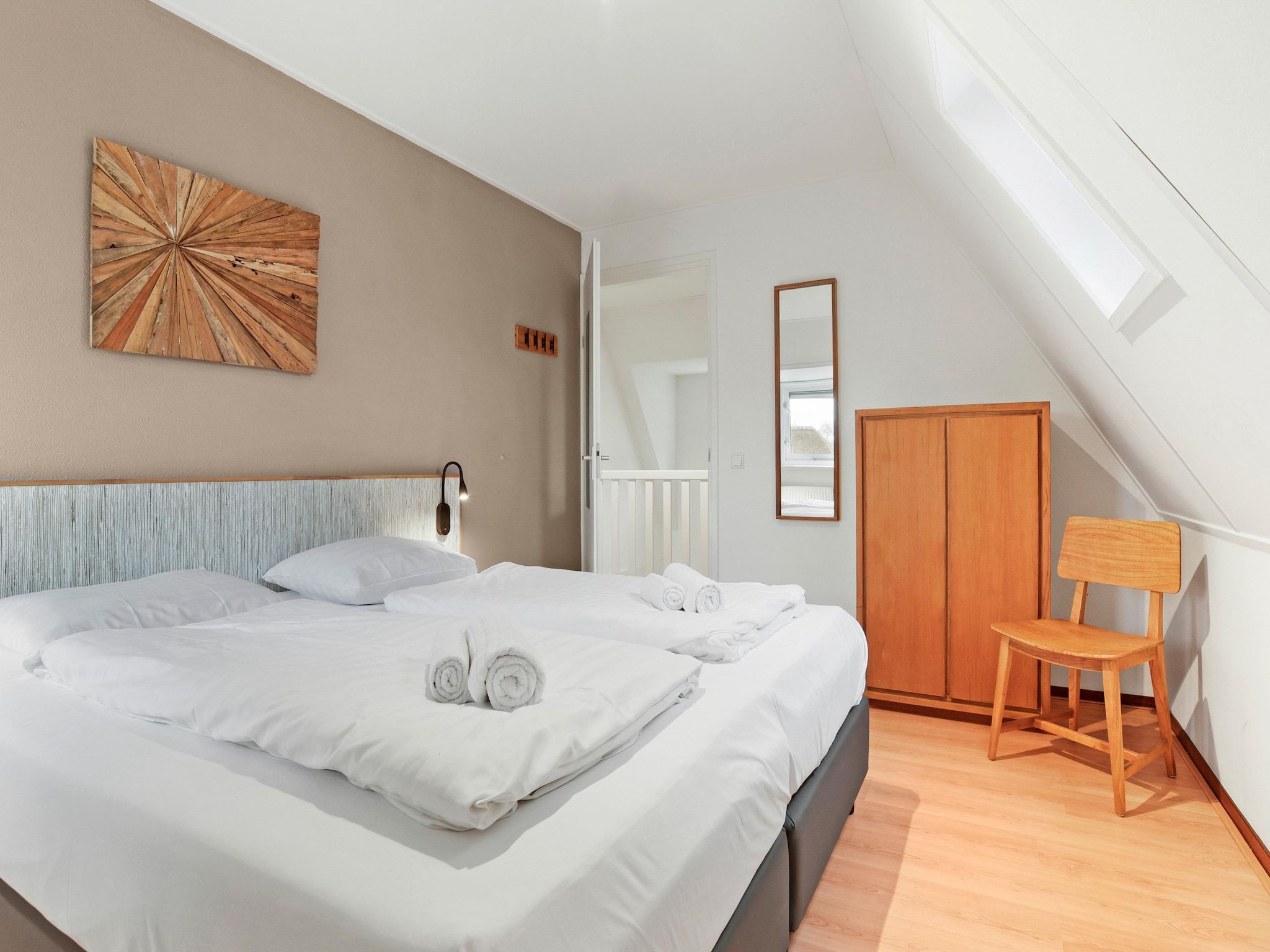 Een slaapkamer van Waterpark De Bloemert 13 in Midlaren