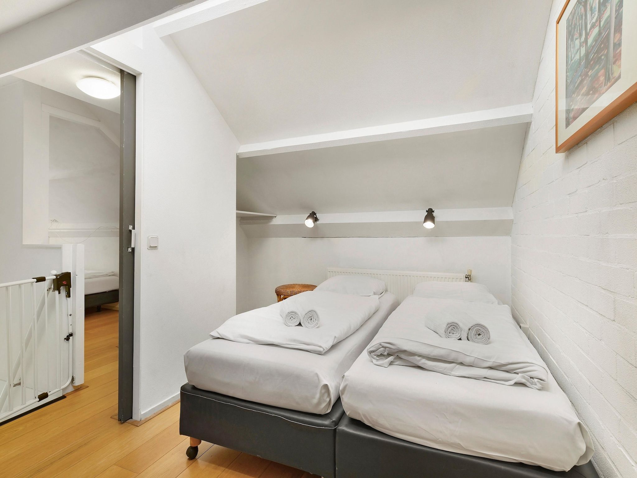 Een slaapkamer van Waterpark De Bloemert 14 in Midlaren