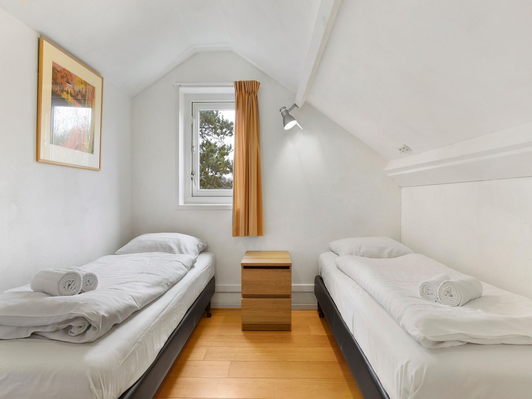 Een slaapkamer van Waterpark De Bloemert 14 in Midlaren