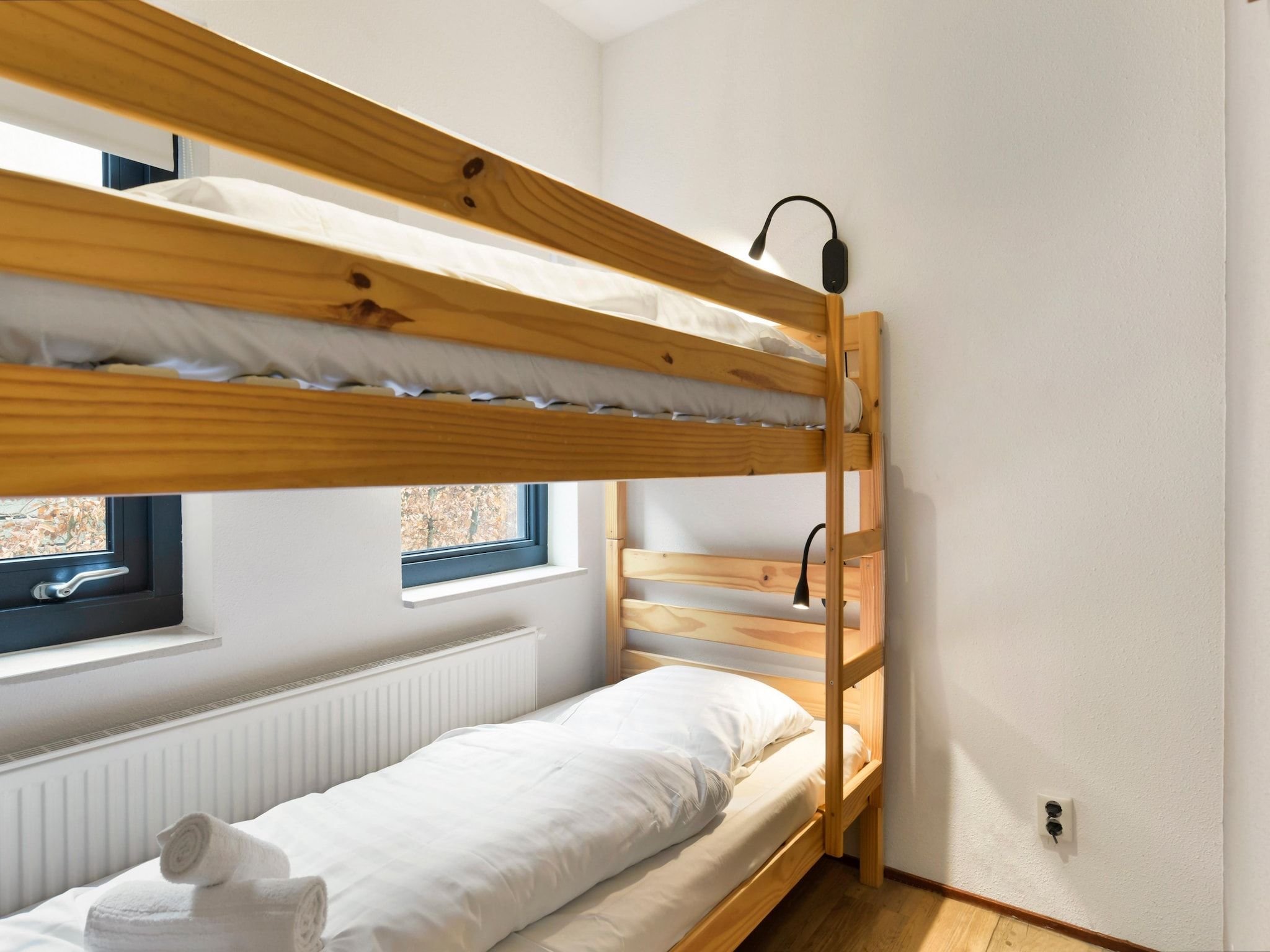 Een slaapkamer van Waterpark De Bloemert 16 in Midlaren