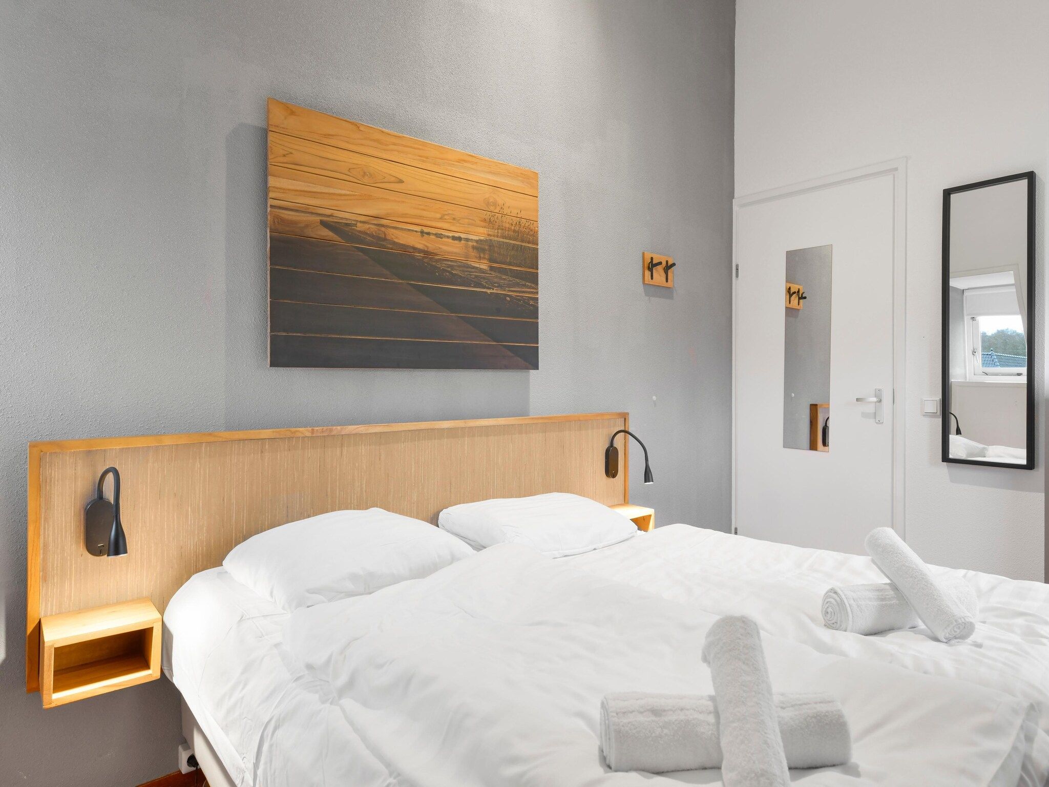 Een slaapkamer van Waterpark De Bloemert 17 in Midlaren