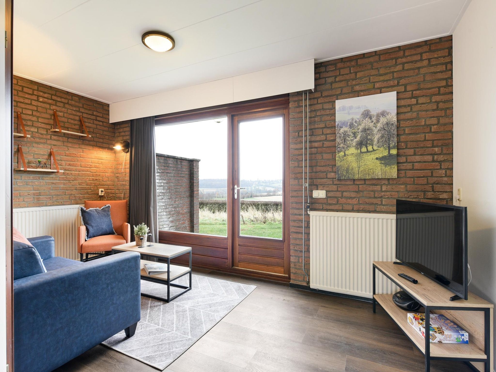 De woonkamer van Bungalow 2A in Vijlen