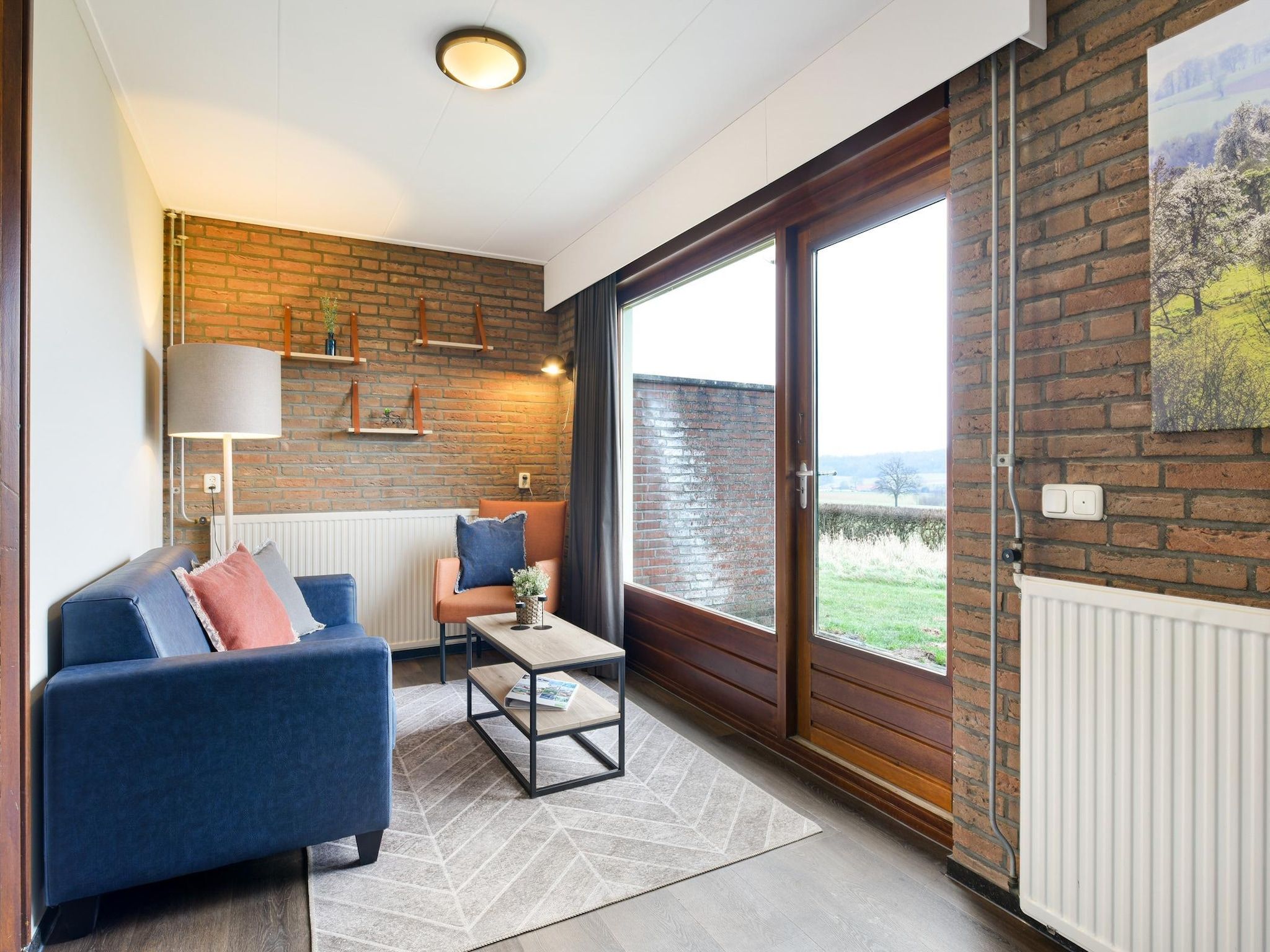 De woonkamer van Bungalow 2A in Vijlen