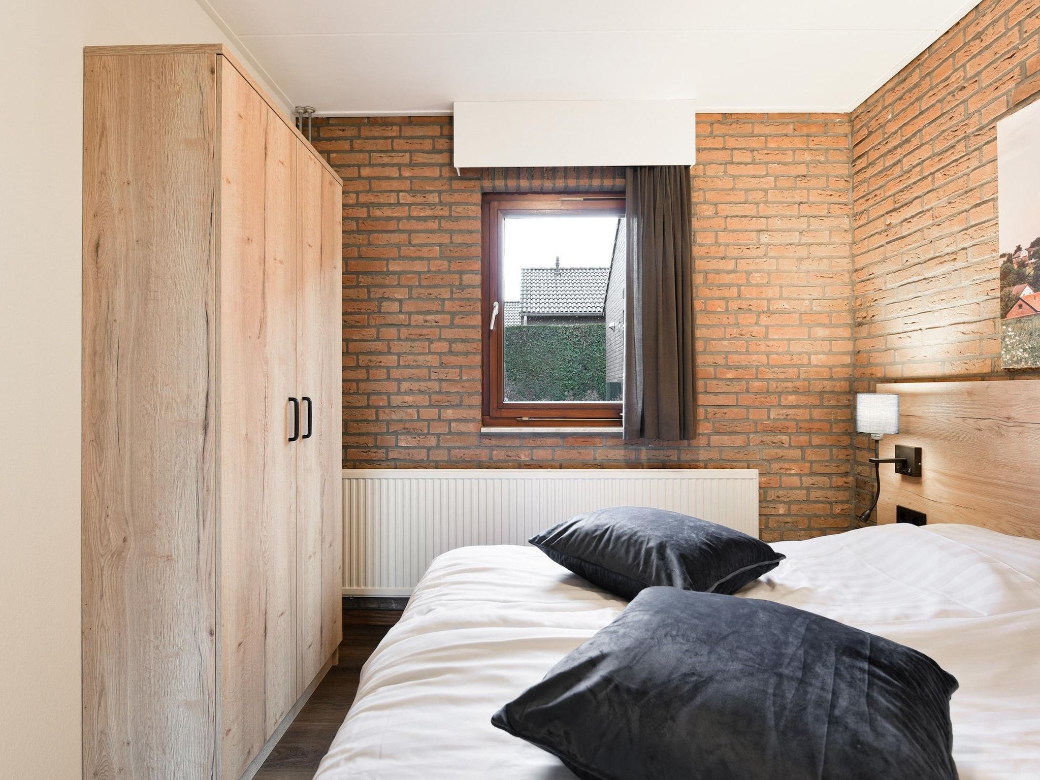 Een slaapkamer van Bungalow 2A in Vijlen