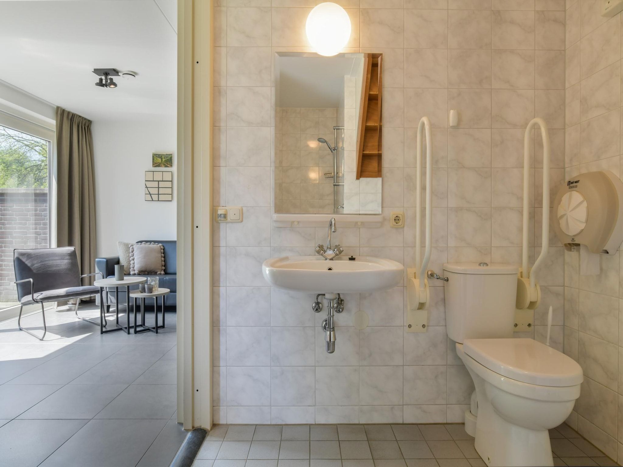 De badkamer van Vakantiepark Reevallis 5 in Vijlen