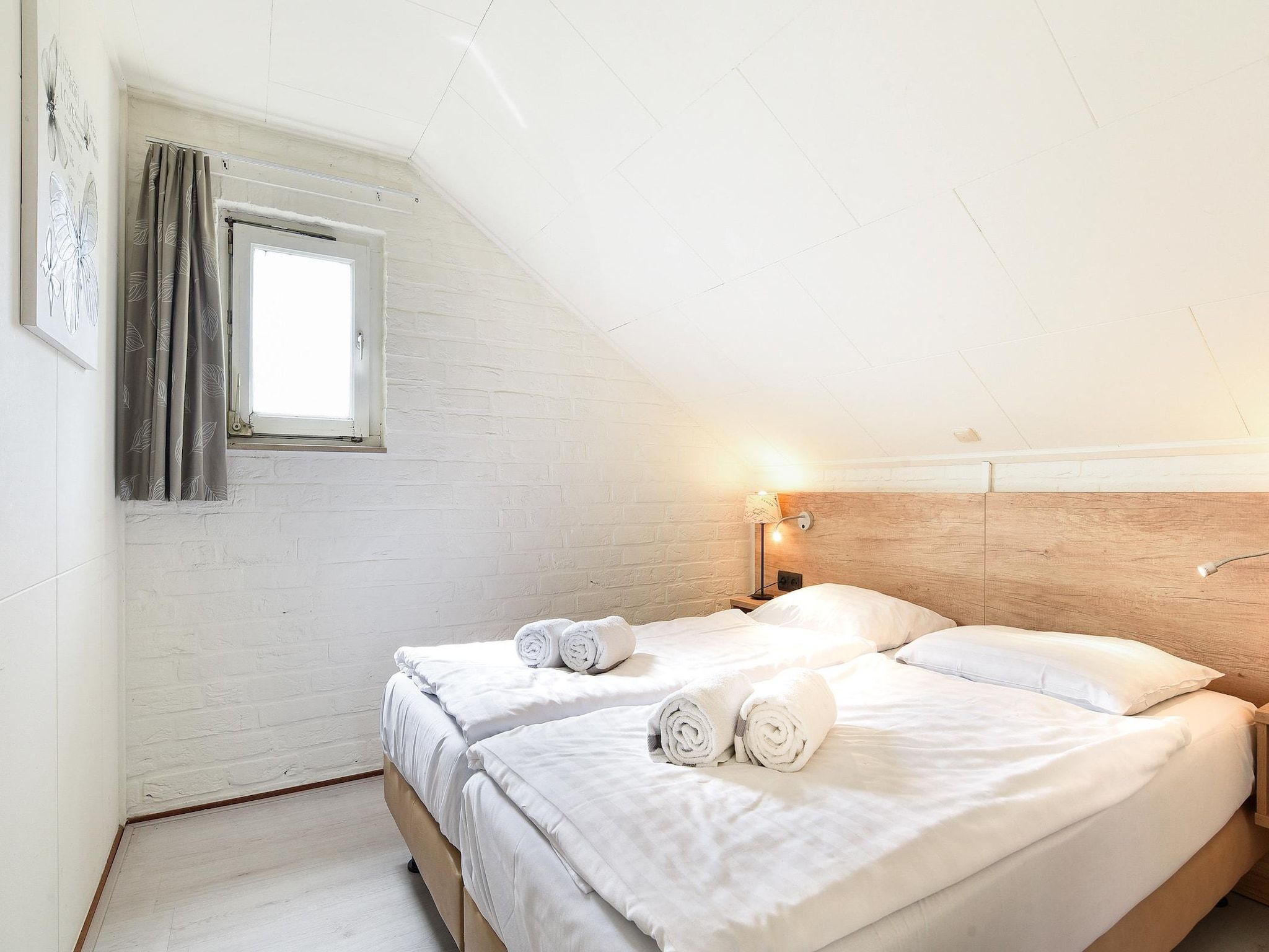 Een slaapkamer van Vakantiepark Reevallis 6 in Vijlen