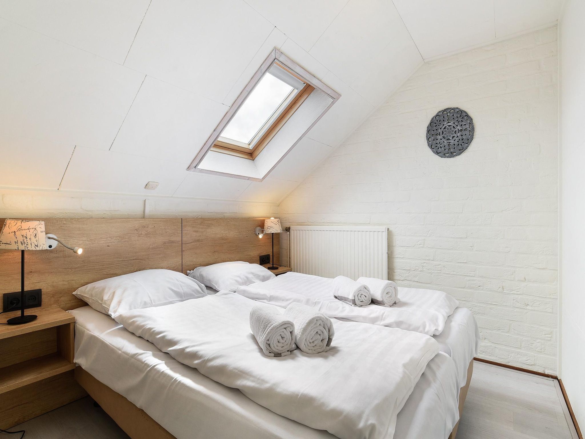 Een slaapkamer van Vakantiepark Reevallis 6 in Vijlen