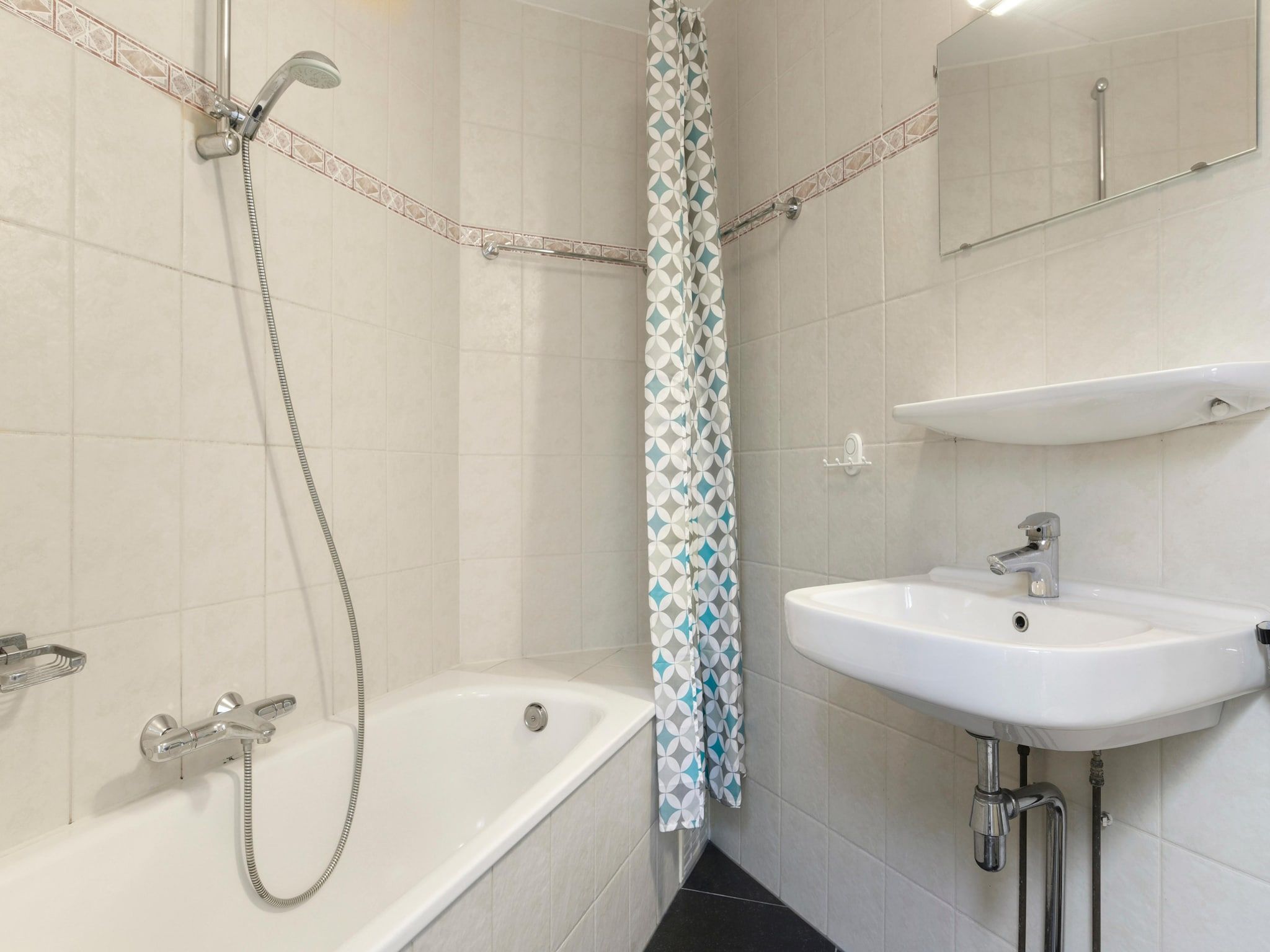 De badkamer van Parc Port Greve 7 in Brouwershaven