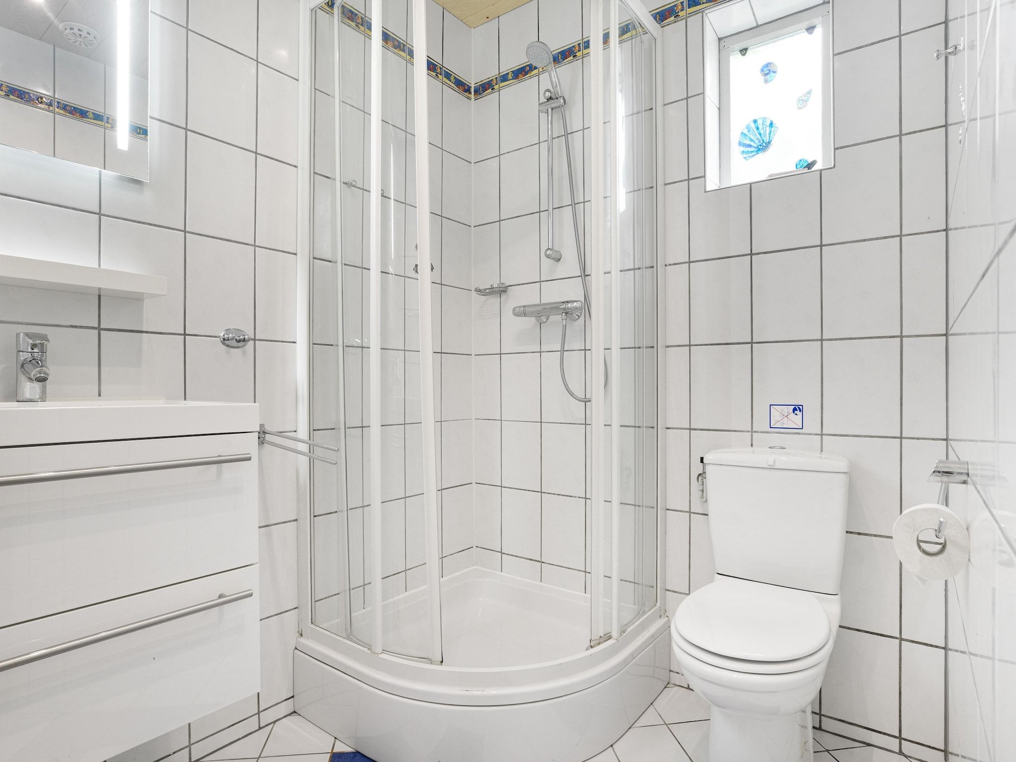 De badkamer van Parc Port Greve 8 in Brouwershaven