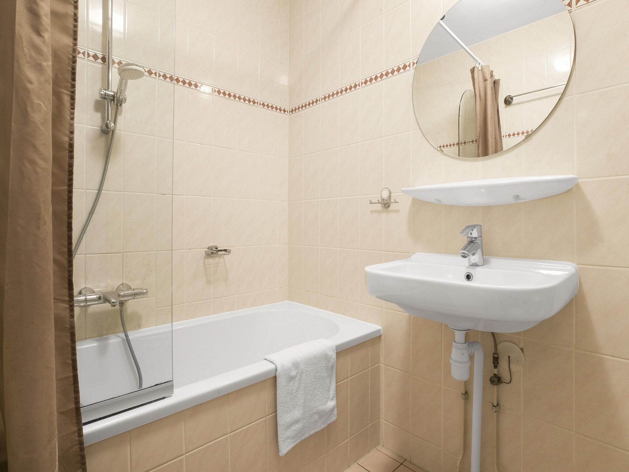 De badkamer van Parc Port Greve 9 in Brouwershaven