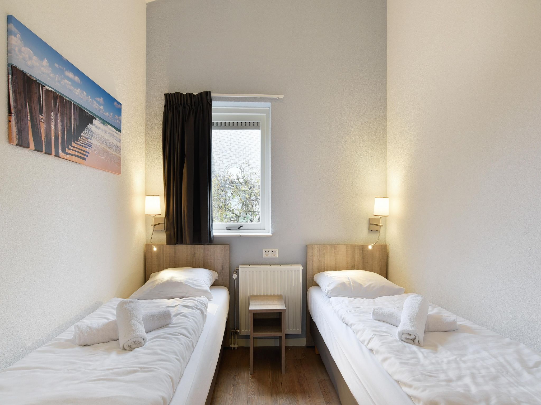 Een slaapkamer van Parc Port Greve 11 in Brouwershaven