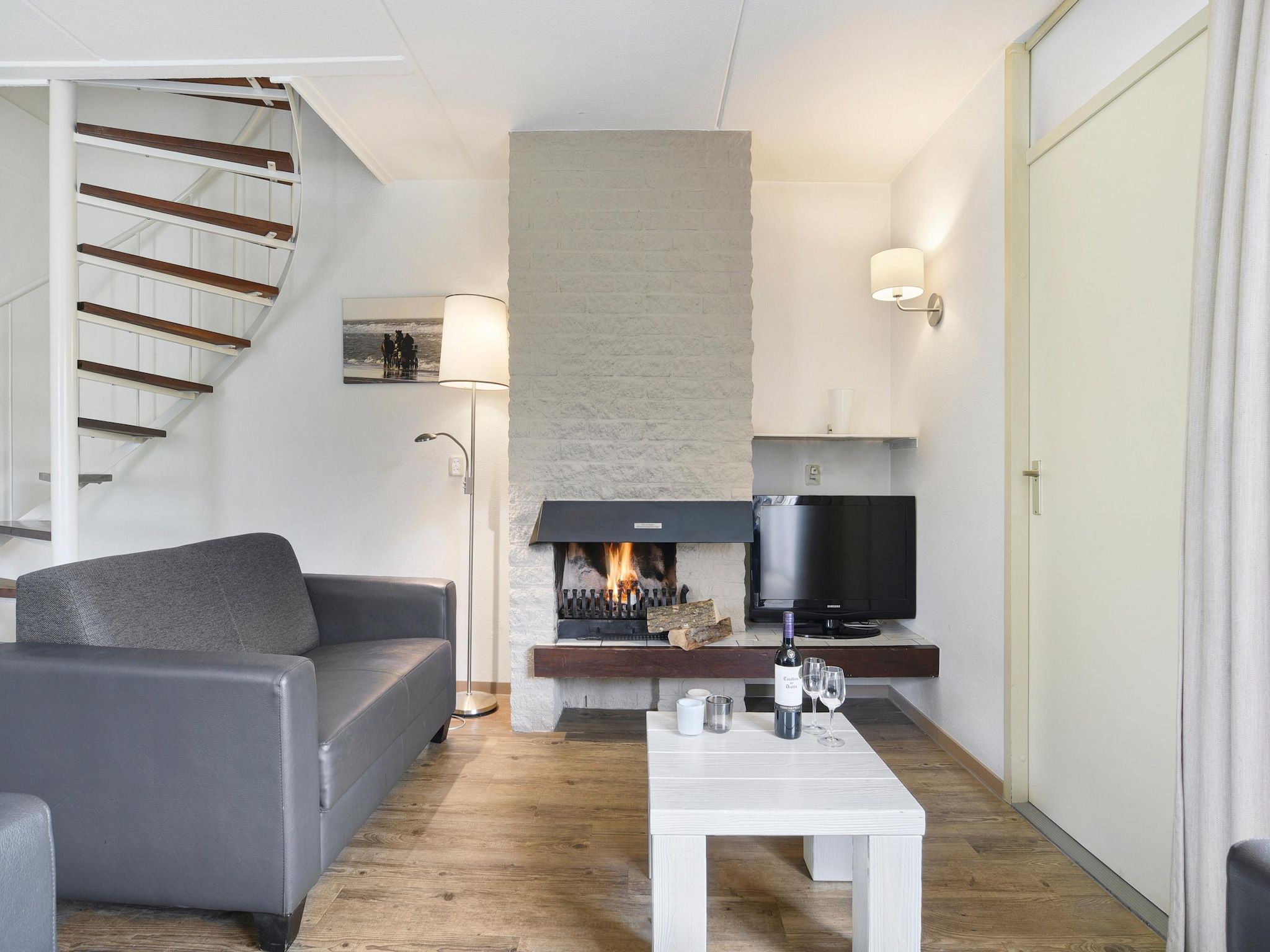 De woonkamer van Parc Port Greve 12 in Brouwershaven