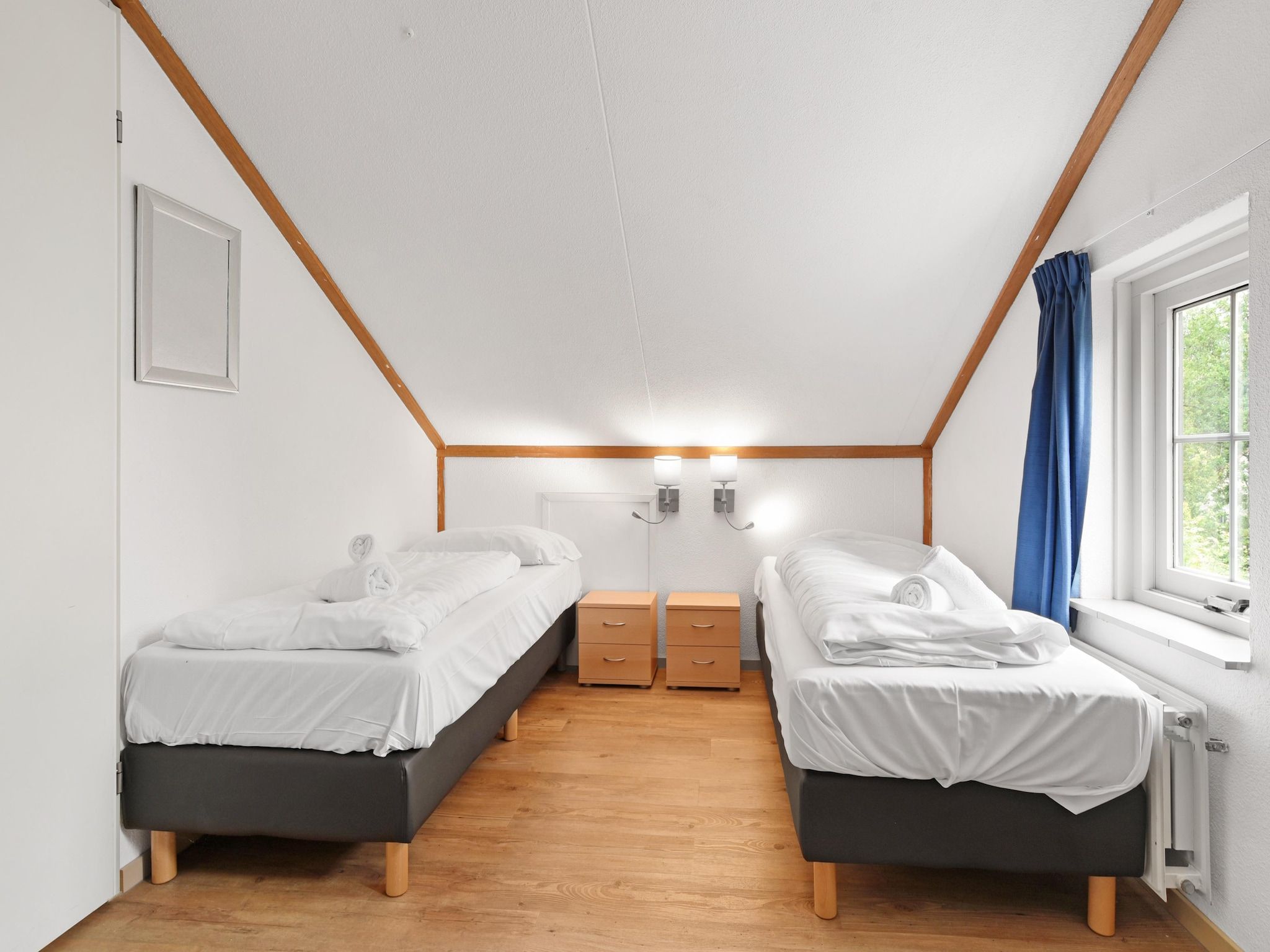 Een slaapkamer van Parc Port Greve 13 in Brouwershaven