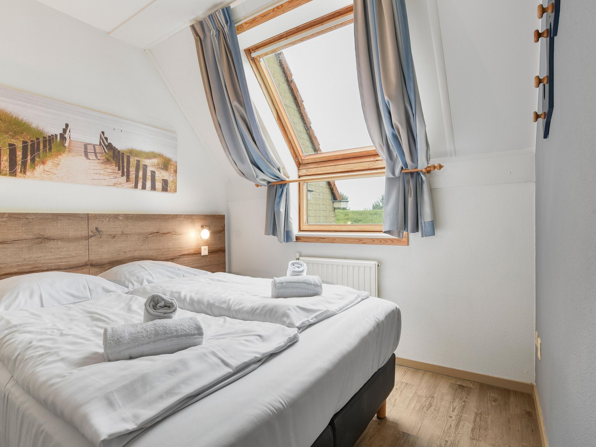 Een slaapkamer van Parc Port Greve 15 in Brouwershaven