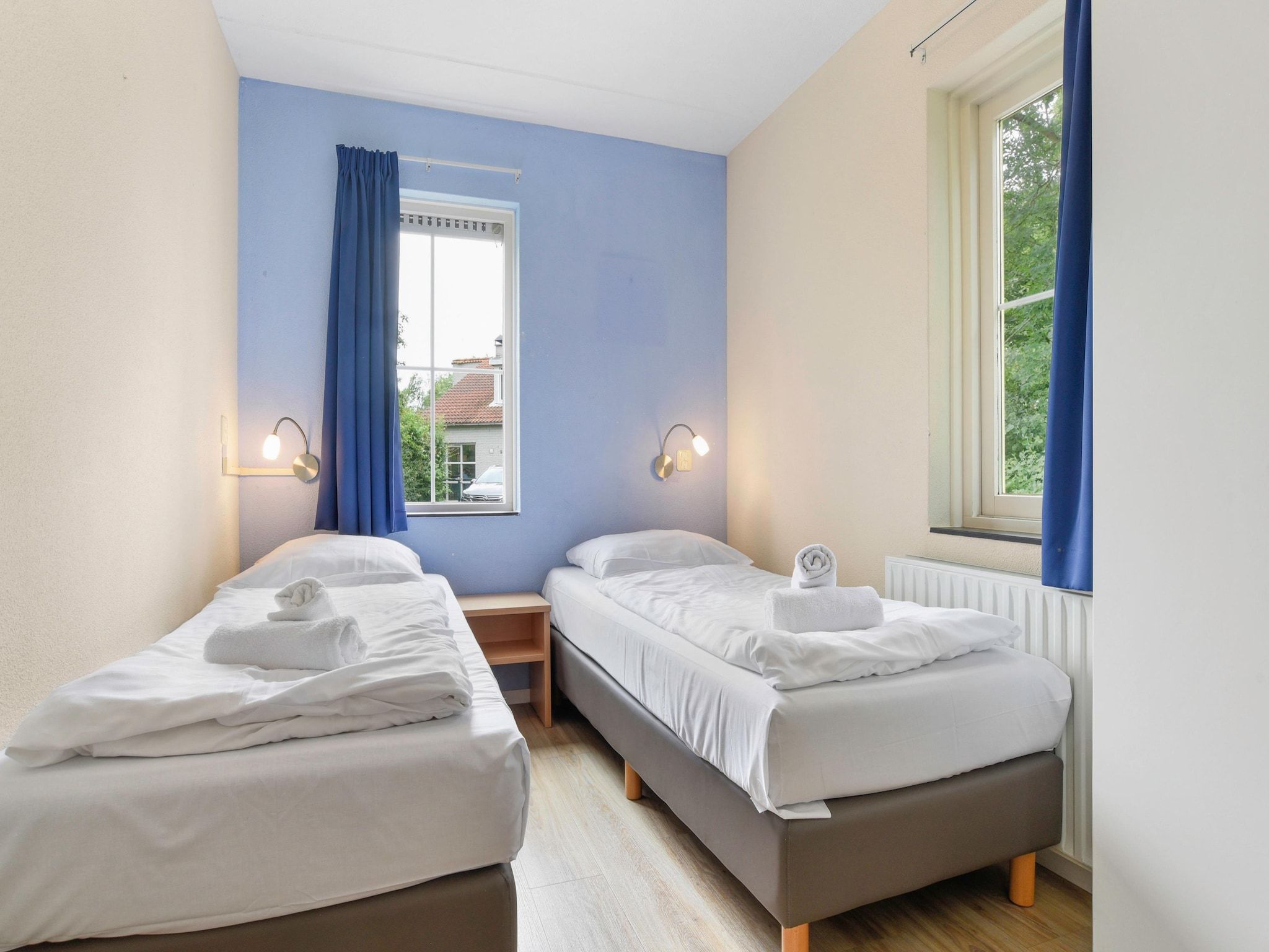 Een slaapkamer van Parc Port Greve 16 in Brouwershaven