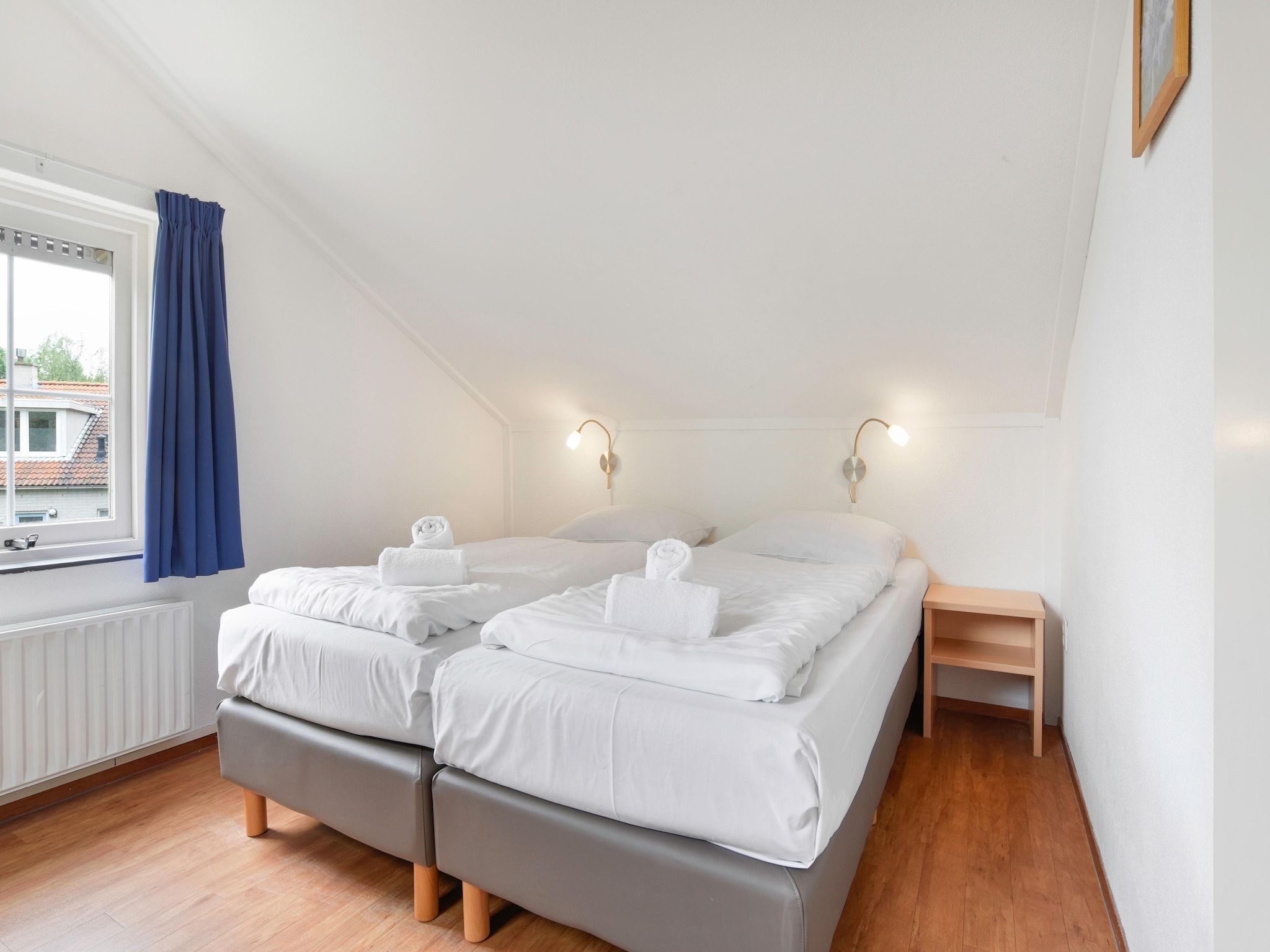 Een slaapkamer van Parc Port Greve 16 in Brouwershaven