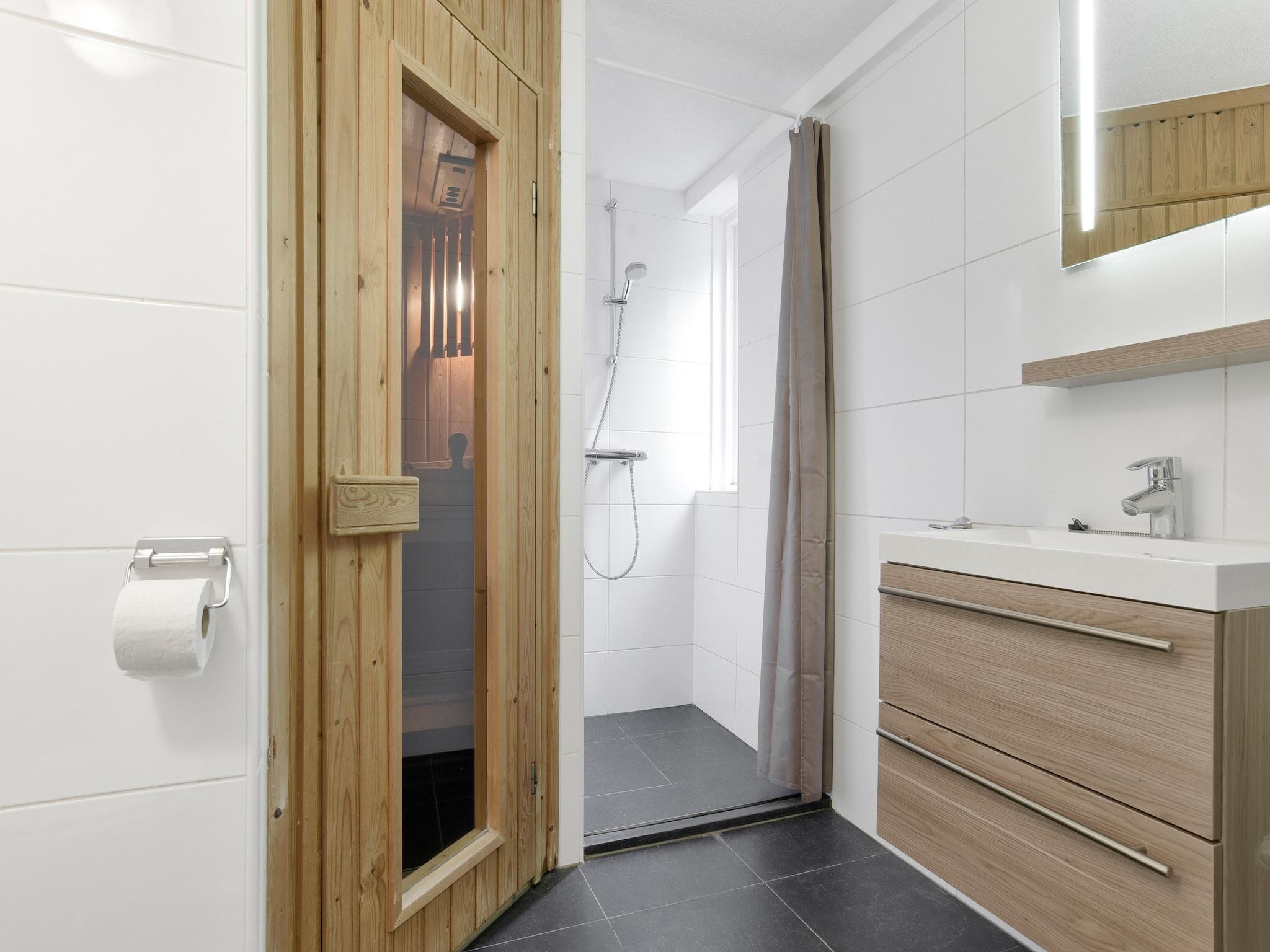 De badkamer van Parc Port Greve 18 in Brouwershaven