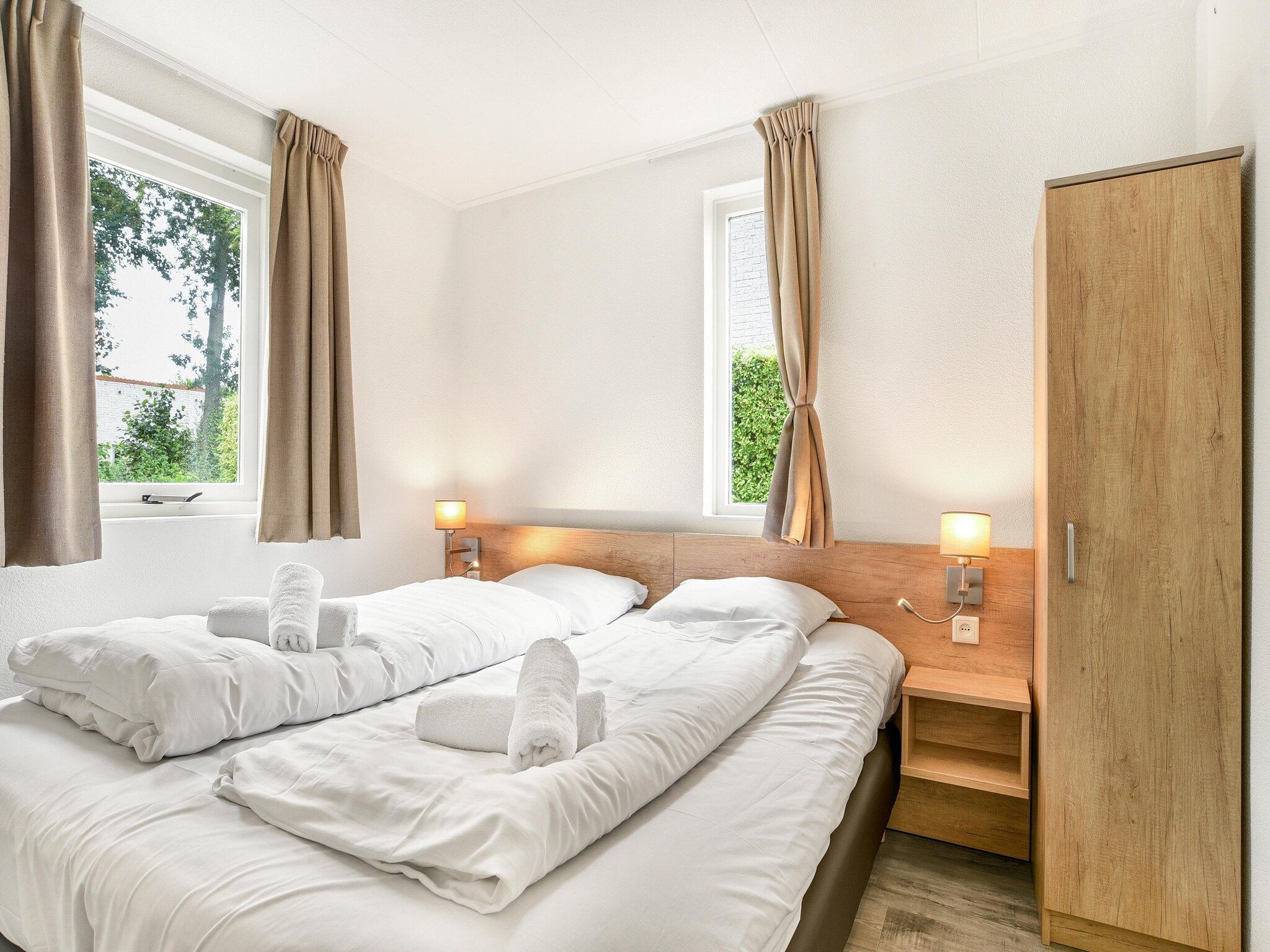 Een slaapkamer van Parc Port Greve 19 in Brouwershaven