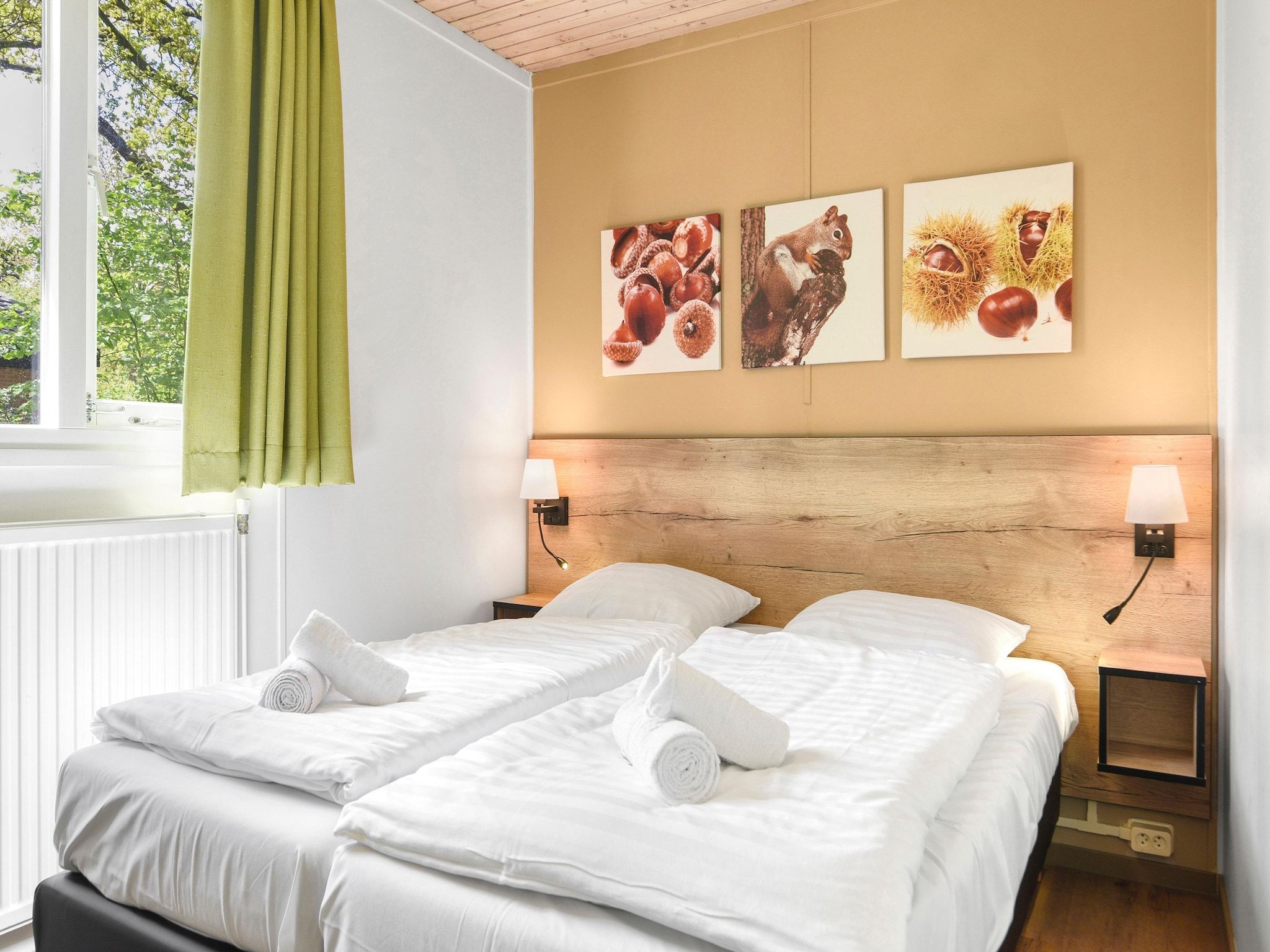 Een slaapkamer van Parc Heihaas 3 in Putten