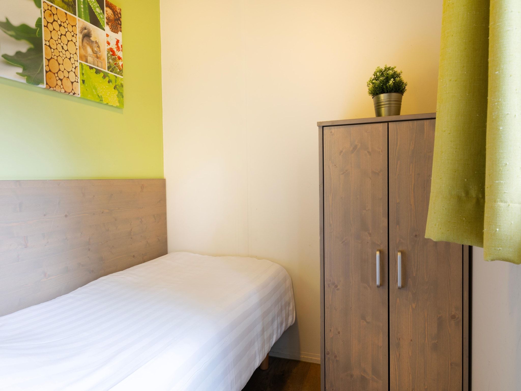 Een slaapkamer van Parc Heihaas 5 in Putten