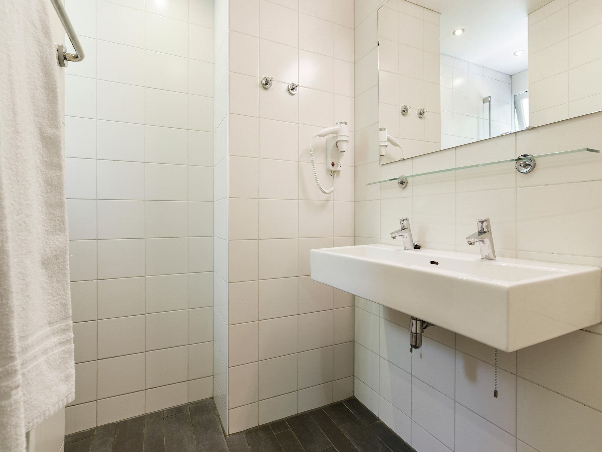 De badkamer van Parc Heihaas 7 in Putten