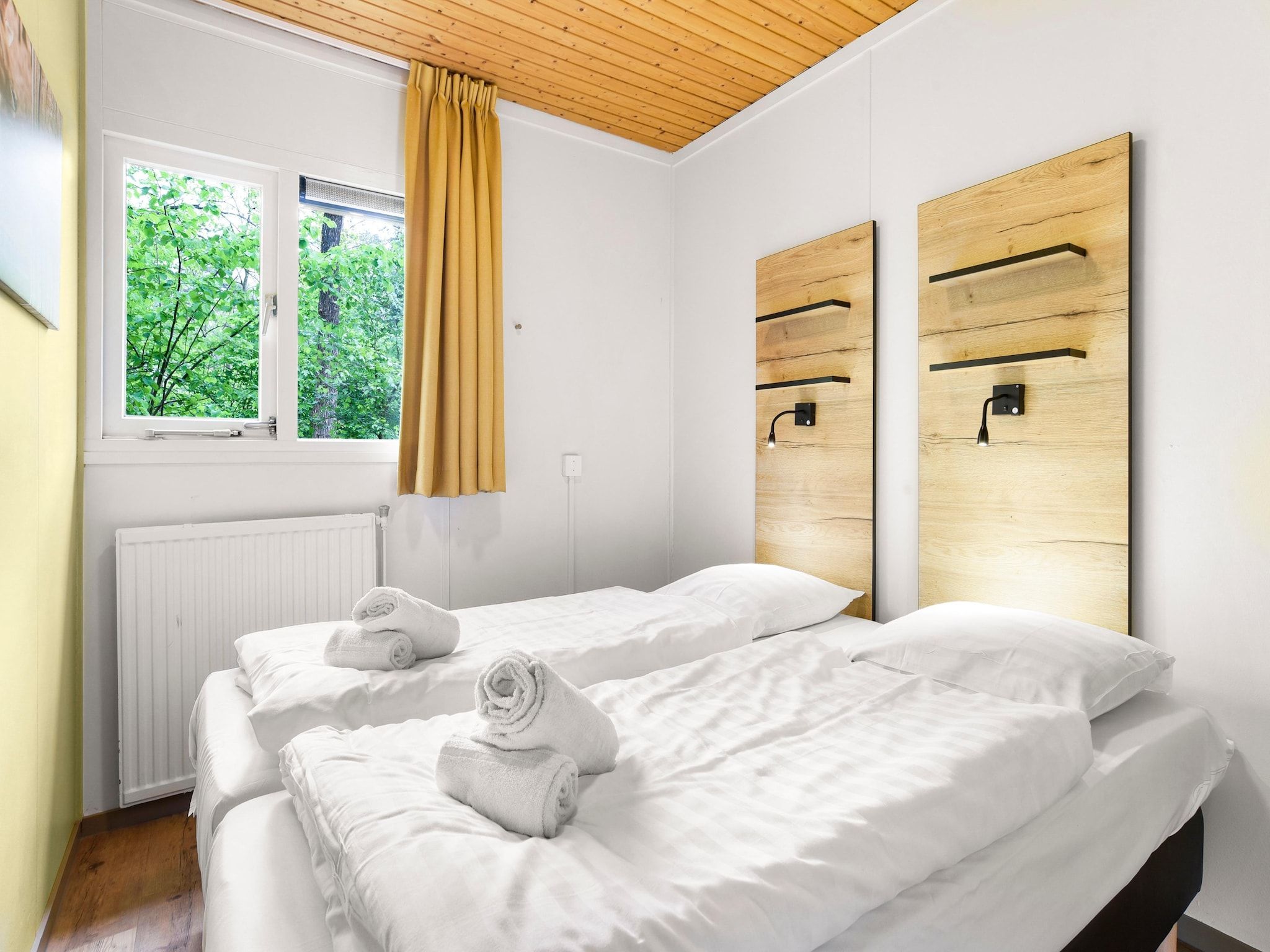 Een slaapkamer van Parc Heihaas 10 in Putten