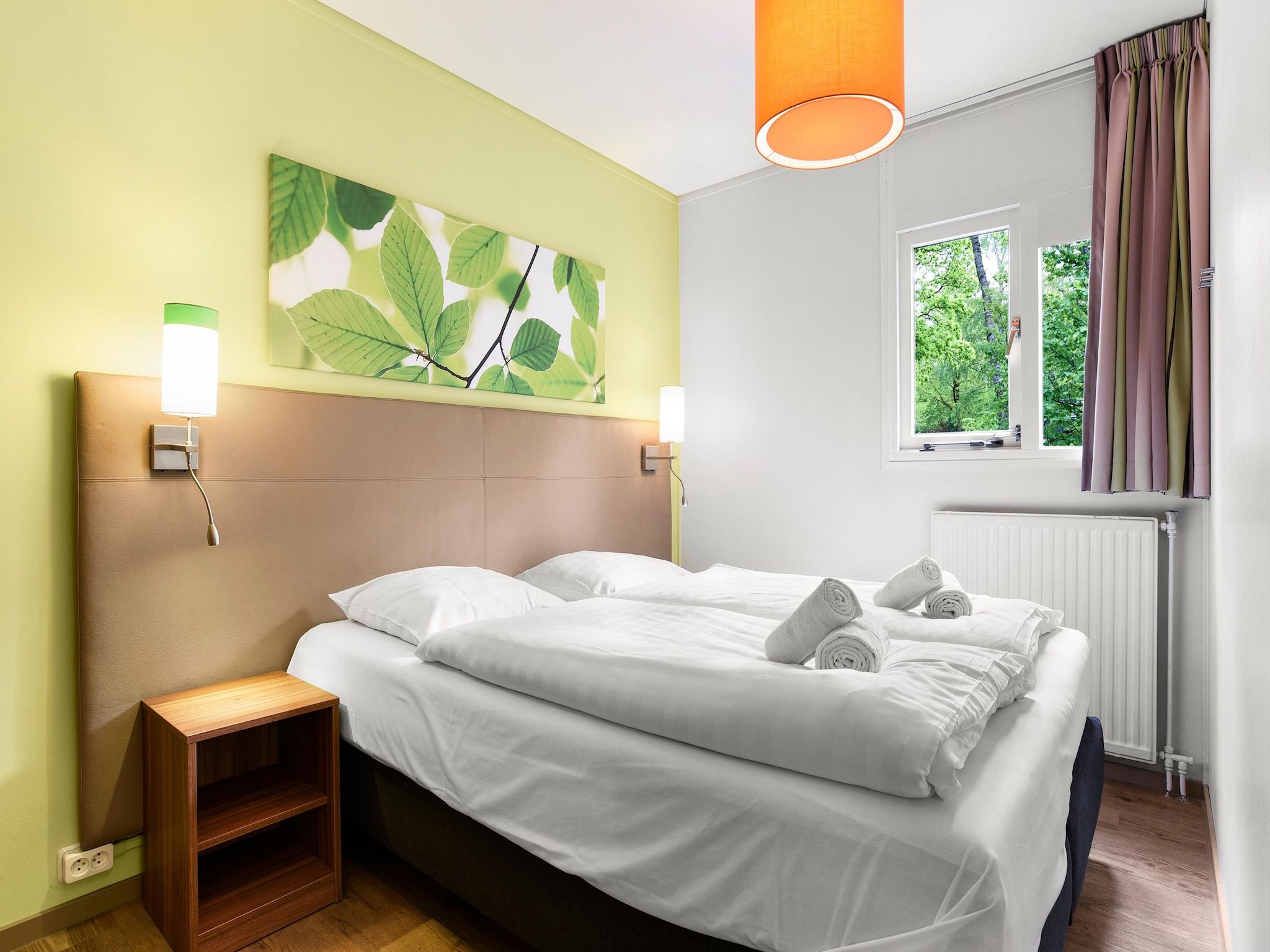 Een slaapkamer van Parc Heihaas 12 in Putten