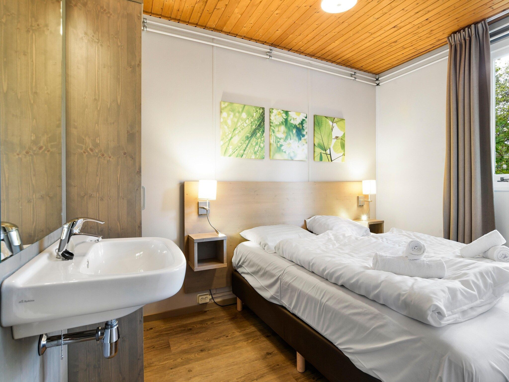 Een slaapkamer van Parc Heihaas 13 in Putten