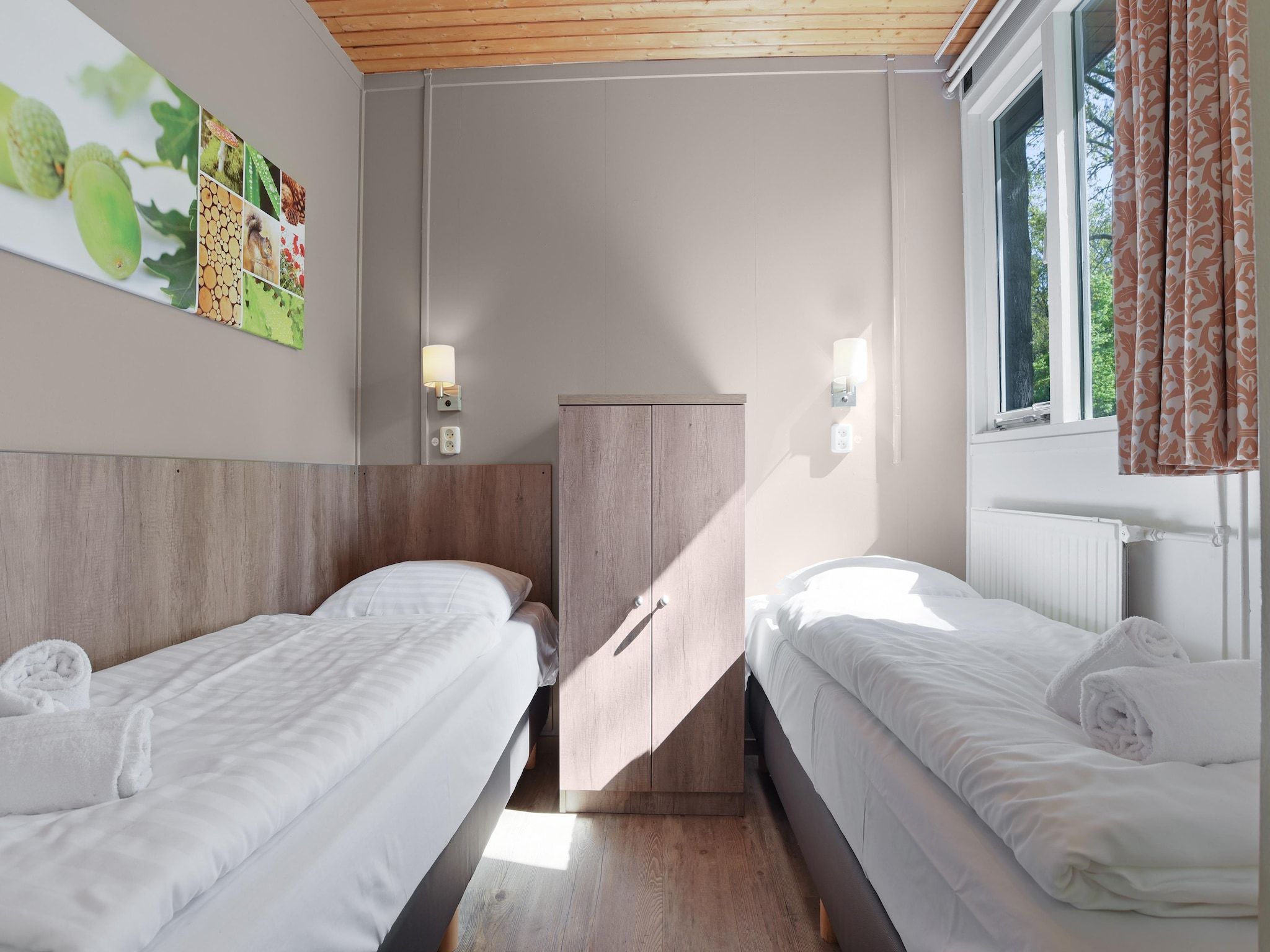 Een slaapkamer van Parc Heihaas 14 in Putten