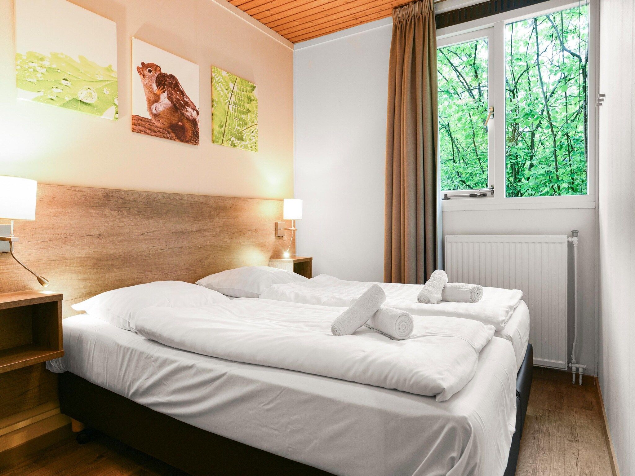 Een slaapkamer van Parc Heihaas 14 in Putten