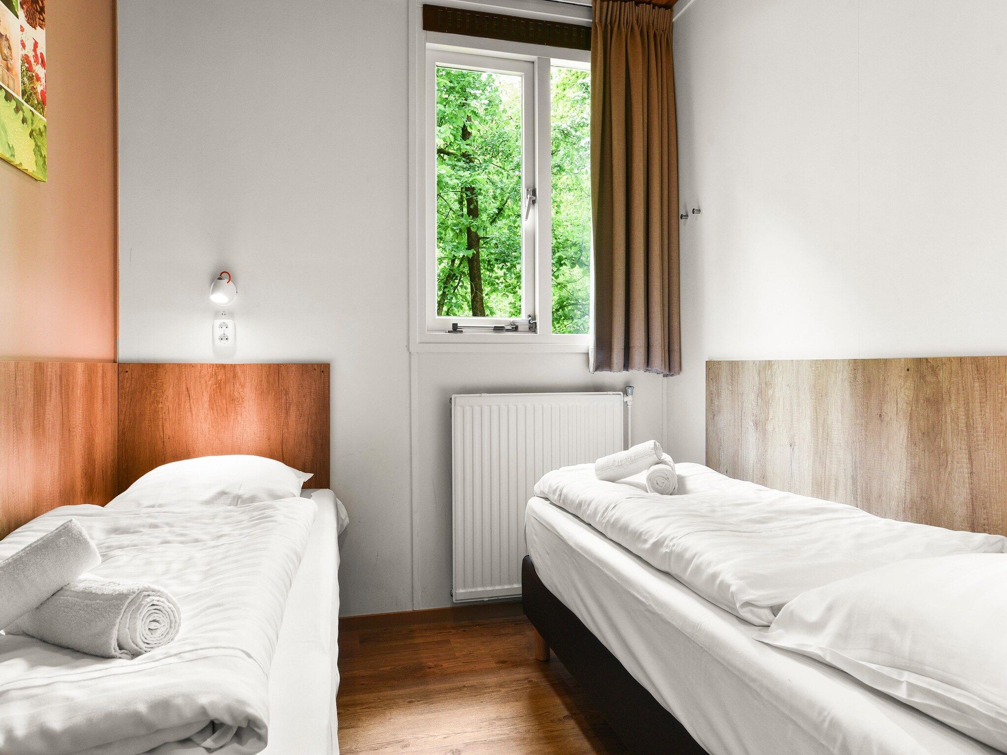 Een slaapkamer van Parc Heihaas 15 in Putten