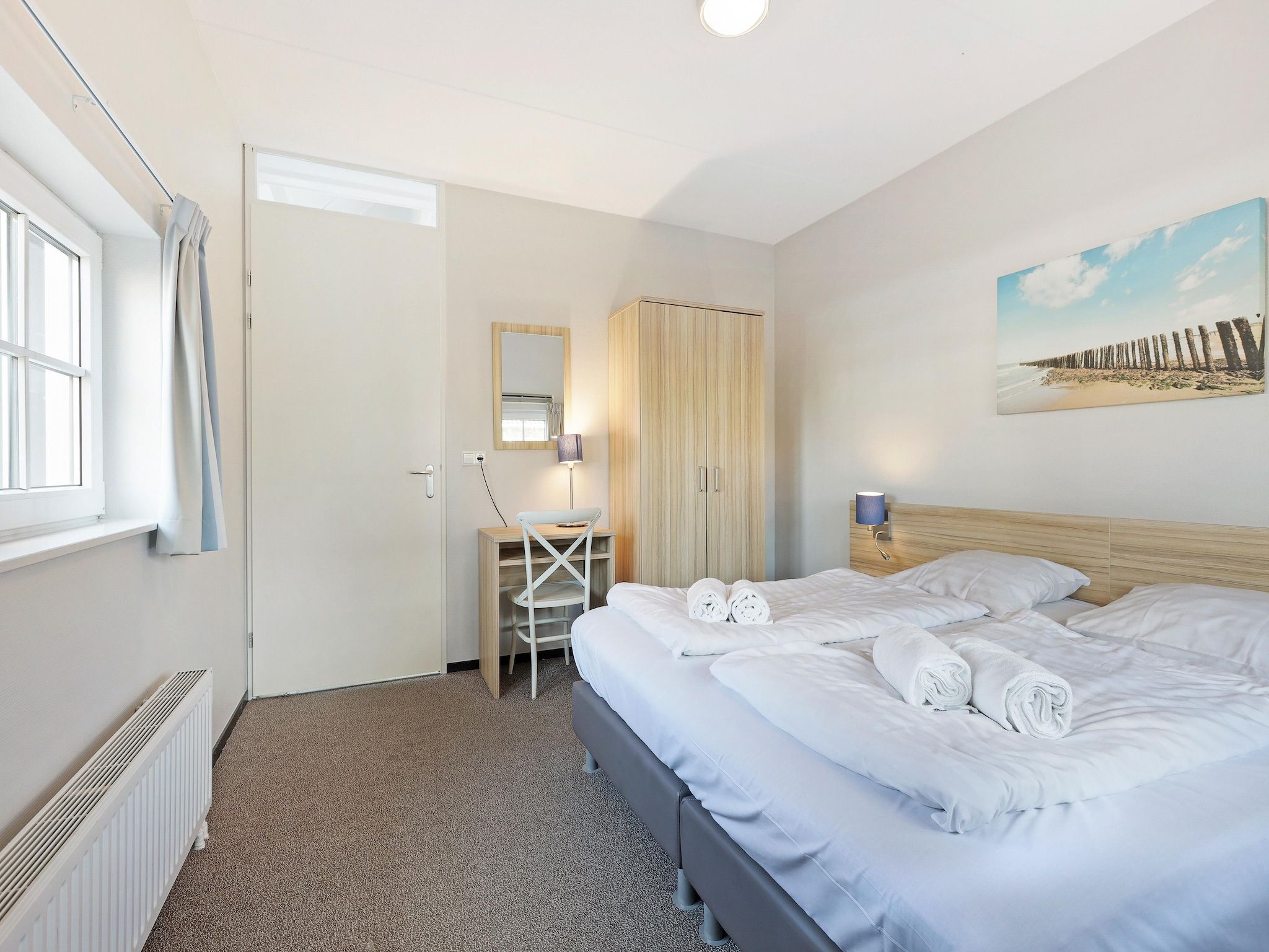 Een slaapkamer van Strand Resort Nieuwvliet-Bad 2 in Nieuwvliet