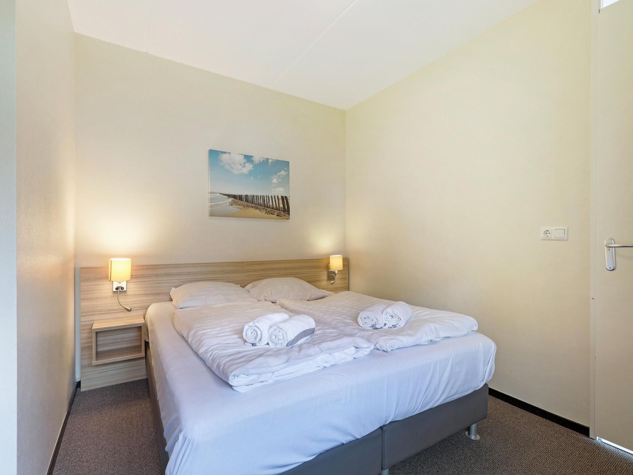 Een slaapkamer van Strand Resort Nieuwvliet-Bad 3 in Nieuwvliet